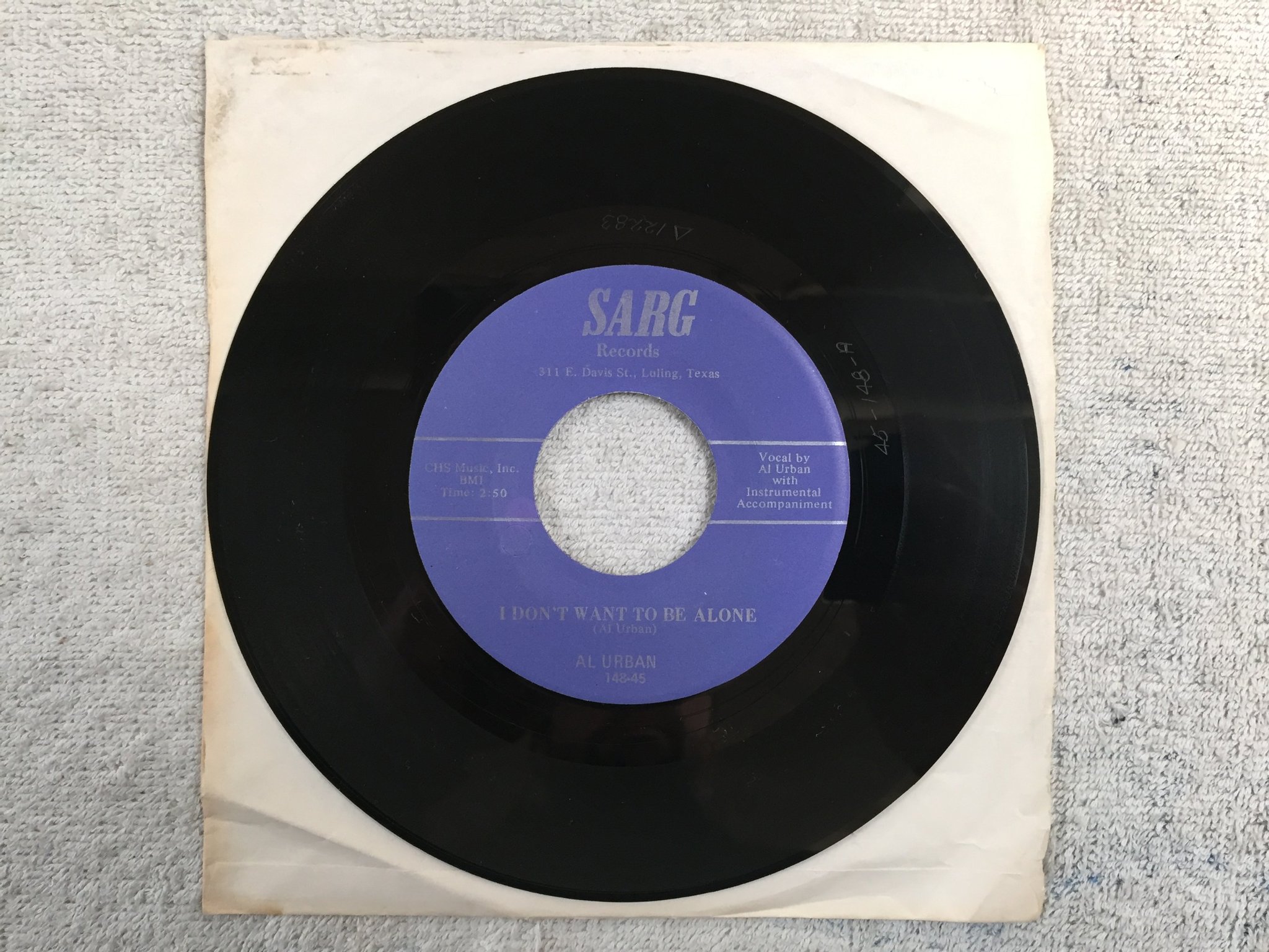 Omslagsbild för skivan AL URBAN looking for money 45"single re US SARG RECORDS 148-45  rockabilly