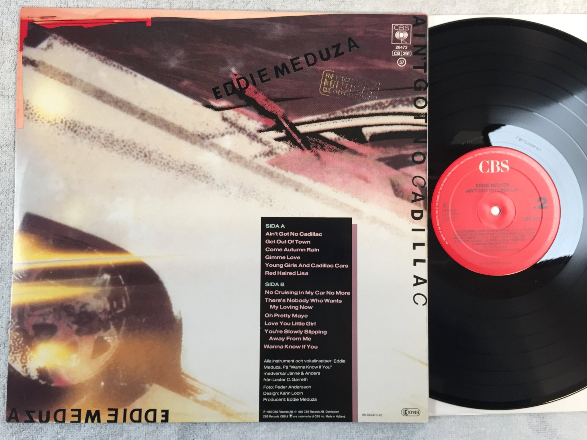 Omslagsbild för skivan EDDIE MEDUZA ain't got no cadillac LP -85 Hol CBS 26473 promo stamp on cover