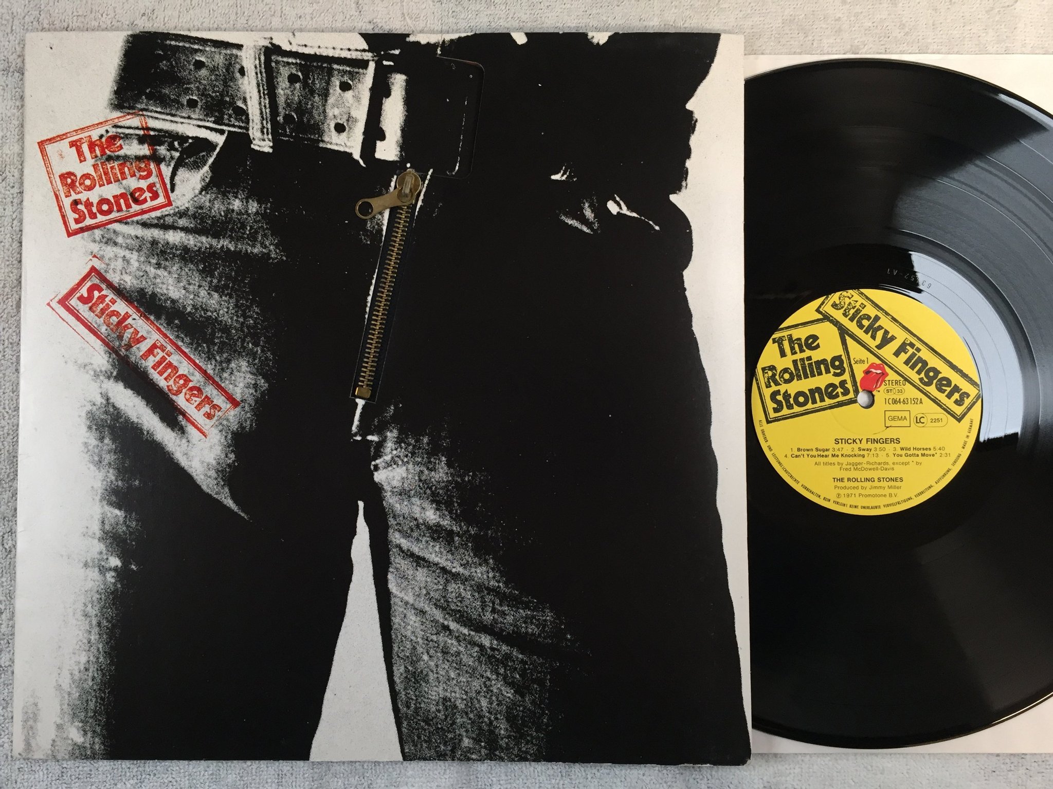 Omslagsbild för skivan THE ROLLING STONES sticky fingers LP Ger ANDY WARHOL cover art TOP CONDITION!