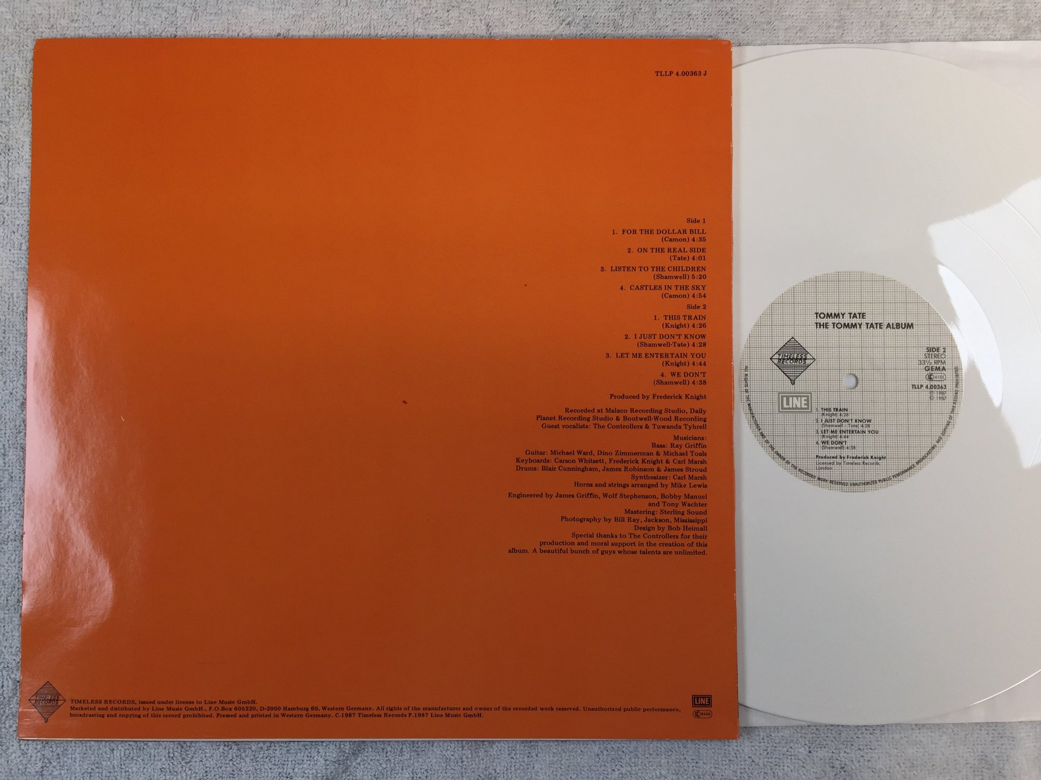 Omslagsbild för skivan the TOMMY TATE album LP -87 TIMLESS TLLP 400363