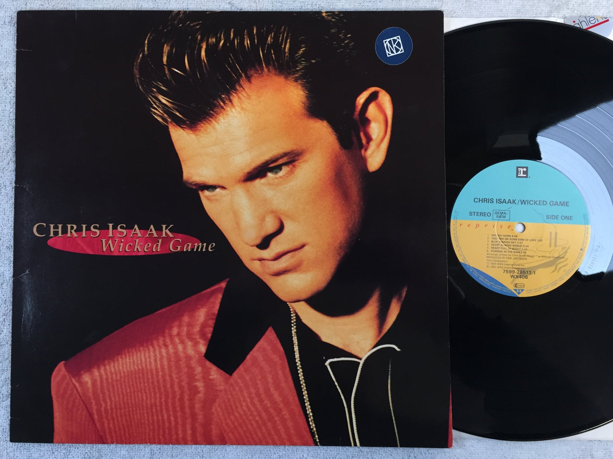 Omslagsbild för skivan CHRIS ISAACS wicked game LP -91 Ger REPRISE 7599-26513-1