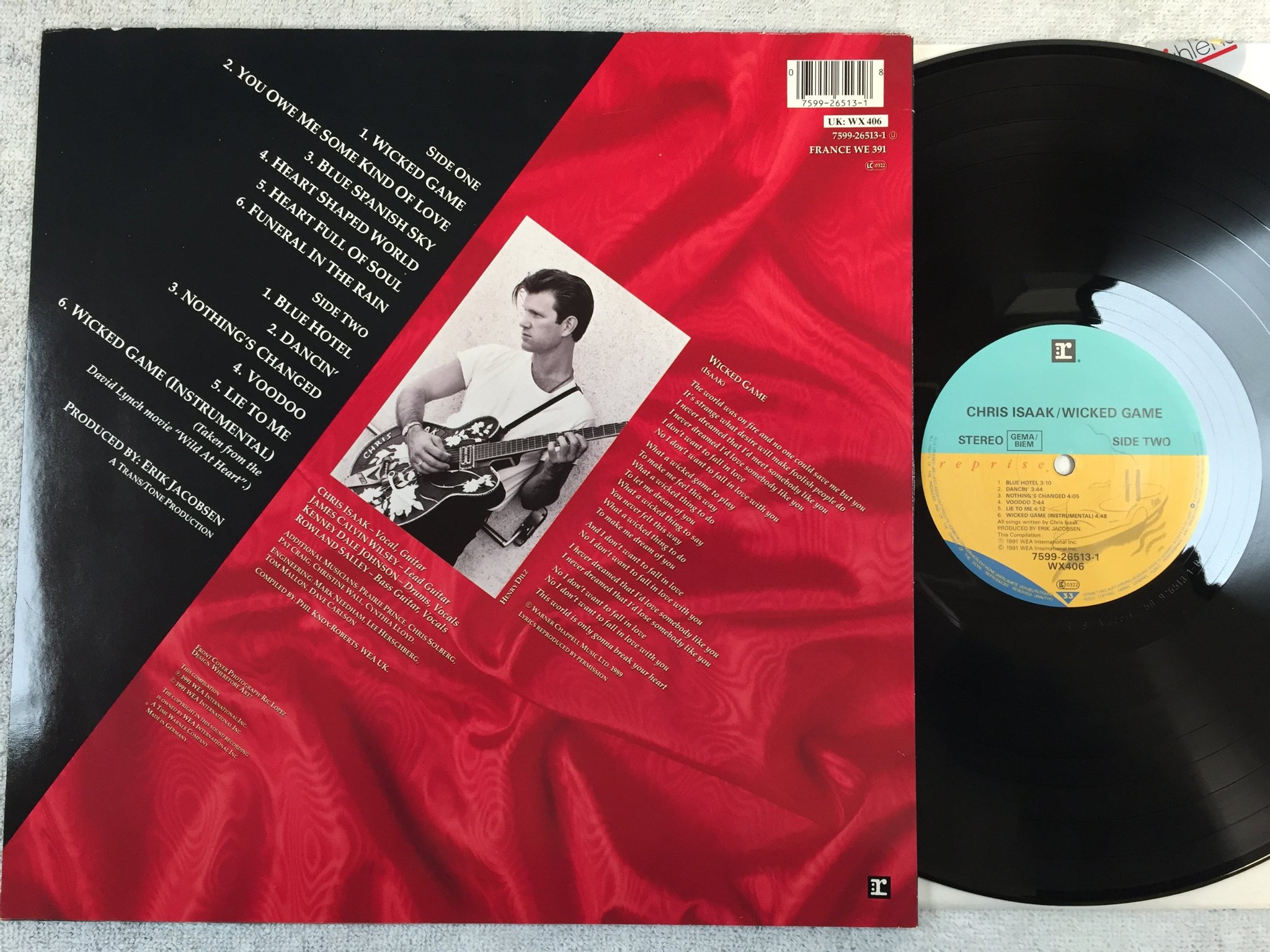 Omslagsbild för skivan CHRIS ISAACS wicked game LP -91 Ger REPRISE 7599-26513-1