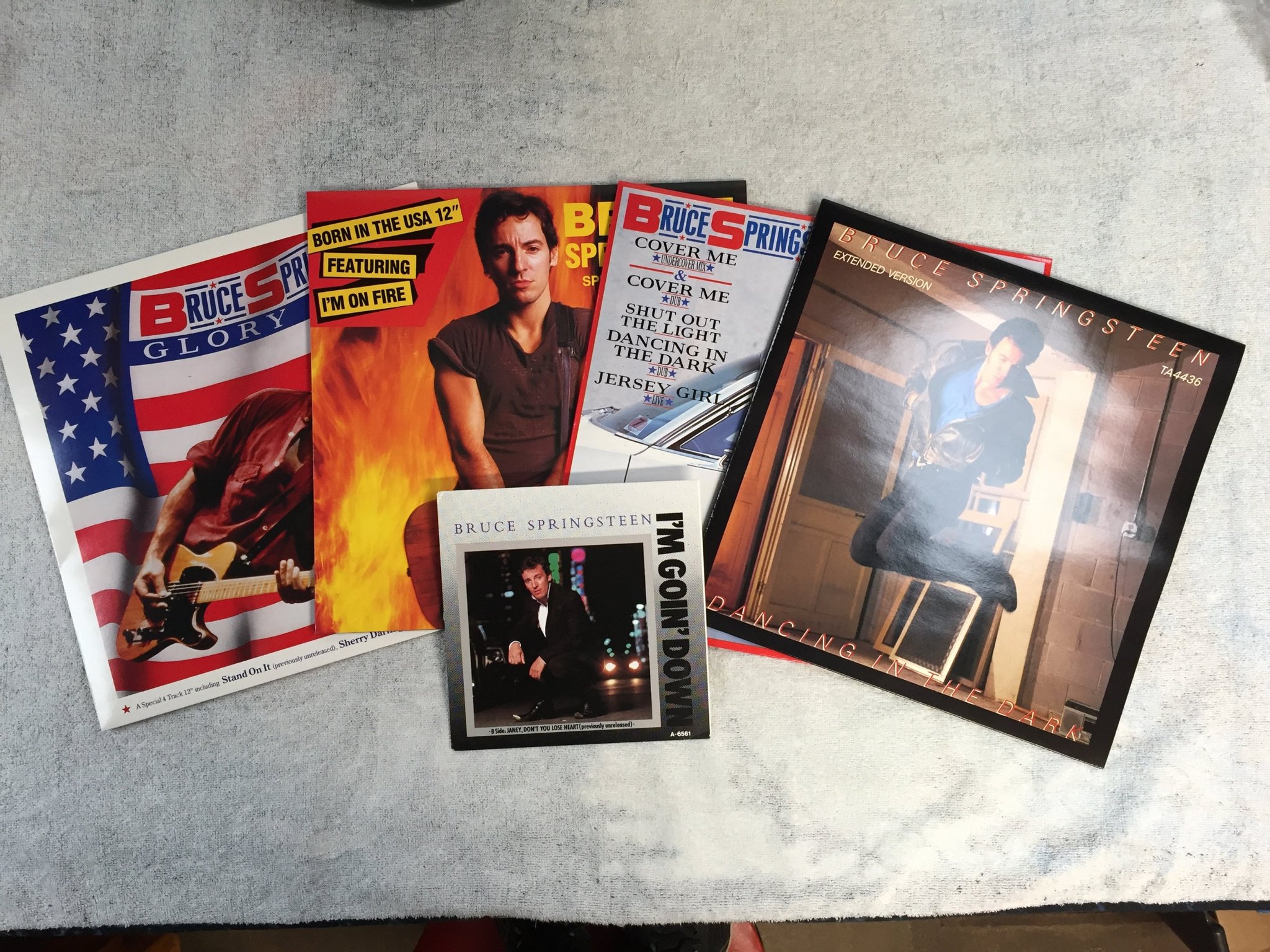 Omslagsbild för skivan BRUCE SPRINGSTEEN The Born In The U.S.A. 4x12" Single Collection + 7"single BOX