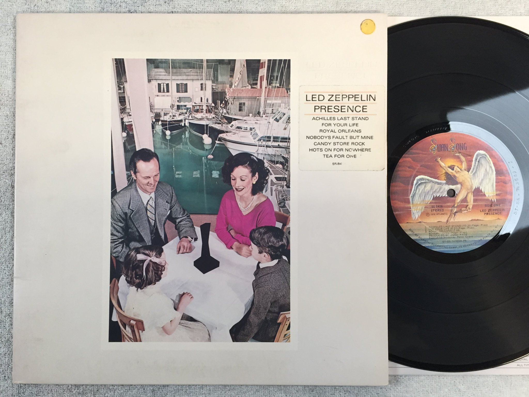 Omslagsbild för skivan Led Zeppelin - presence LP -76 US SWAN SONG SS 8416