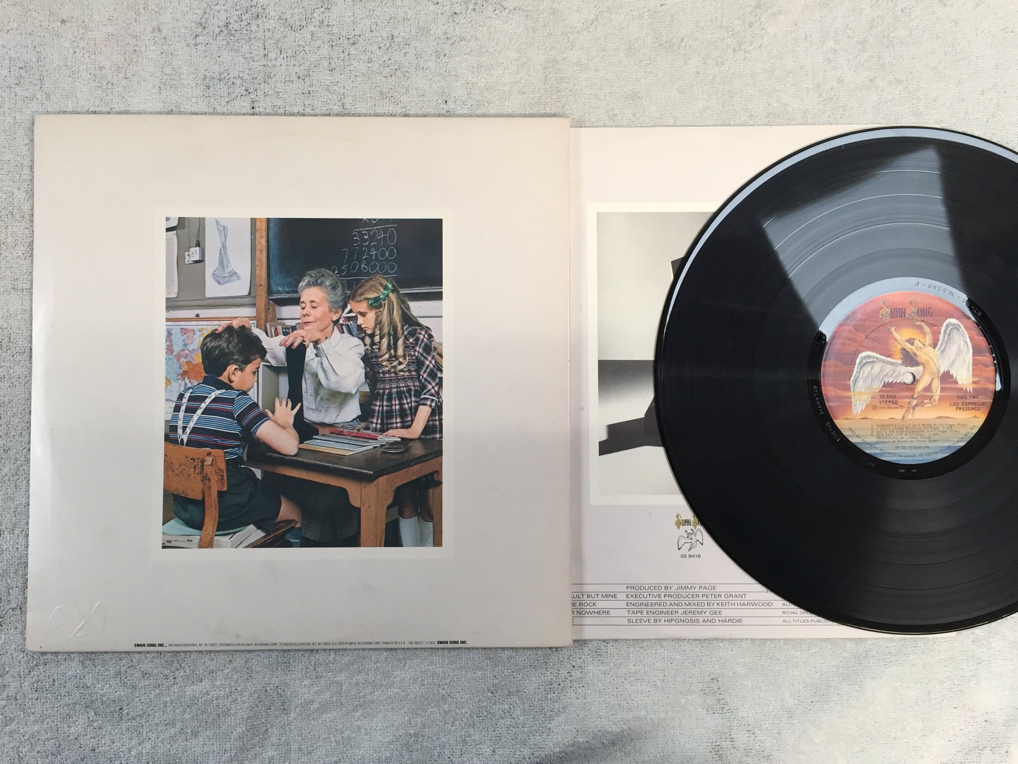 Omslagsbild för skivan Led Zeppelin - presence LP -76 US SWAN SONG SS 8416