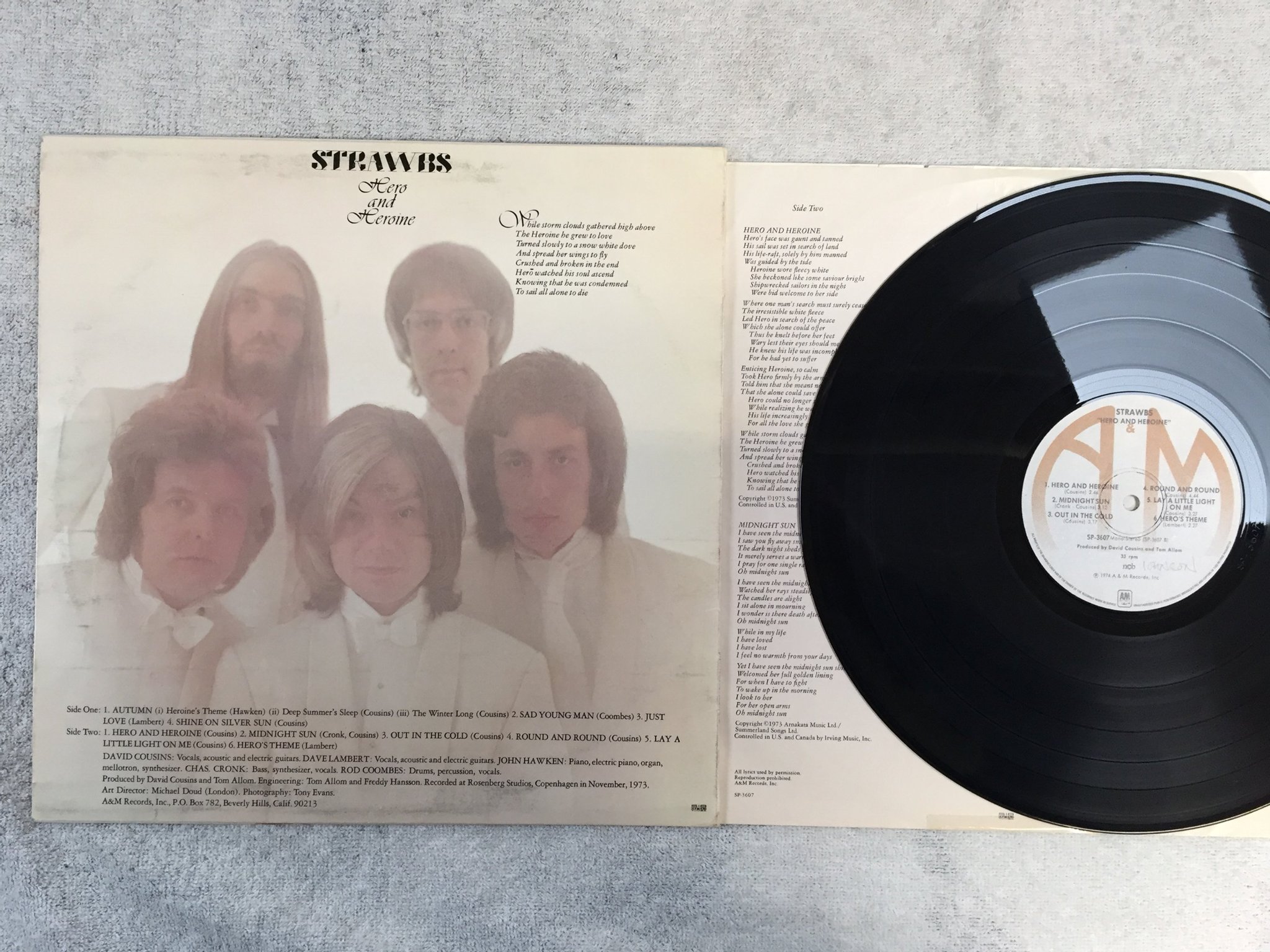 Omslagsbild för skivan STRAWBS hero & heroine LP -74 ncb A&M SP-3607