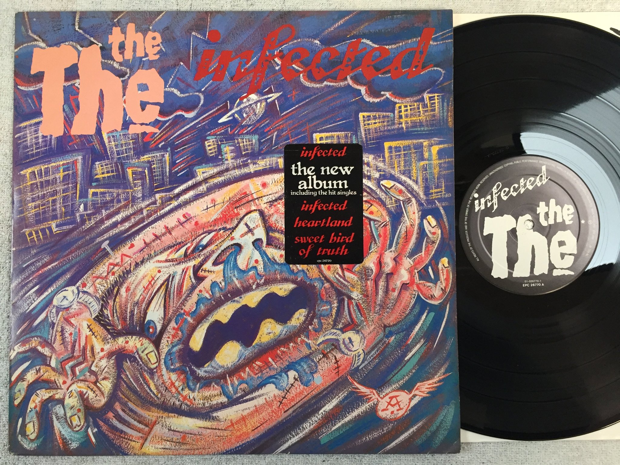 Omslagsbild för skivan THE THE infected LP -86 Hol EPIC EPC 26770