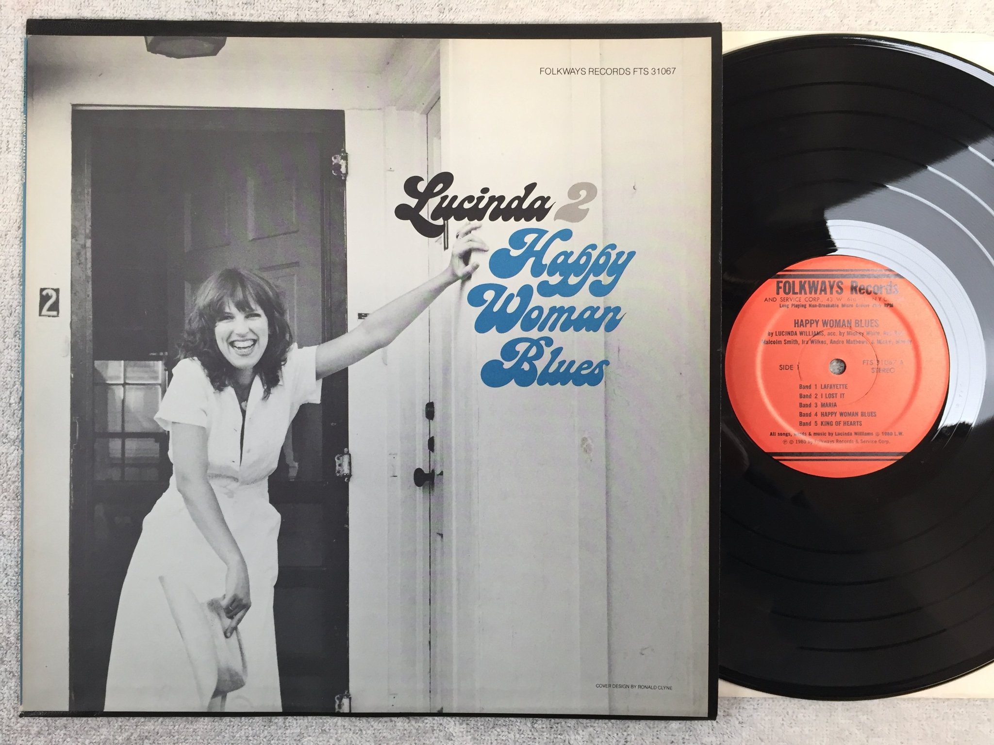 Omslagsbild för skivan LUCINDA WILLIAMS happy woman blues LP - 80 US FOLKWAYS FTS 31067