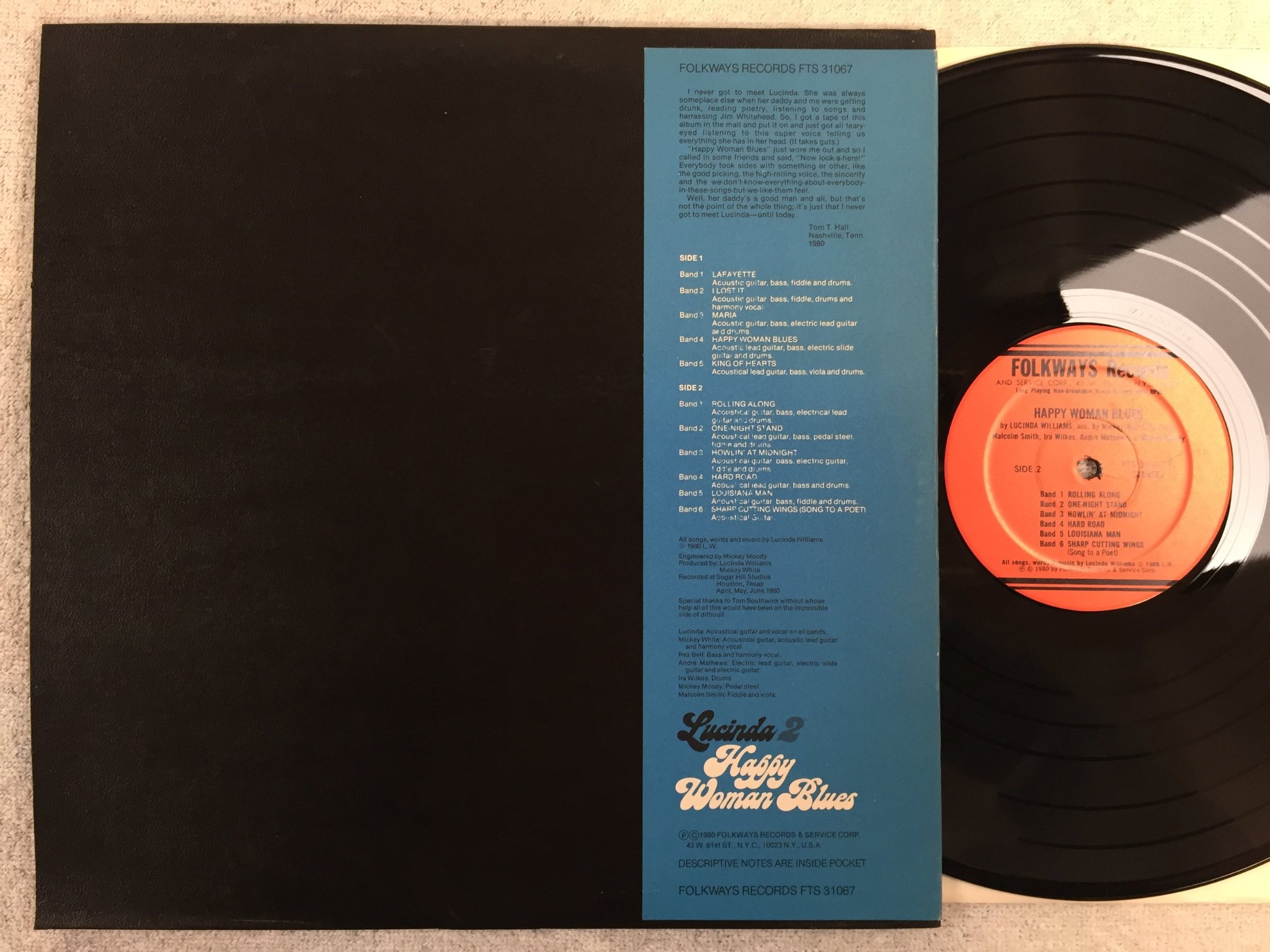Omslagsbild för skivan LUCINDA WILLIAMS happy woman blues LP - 80 US FOLKWAYS FTS 31067