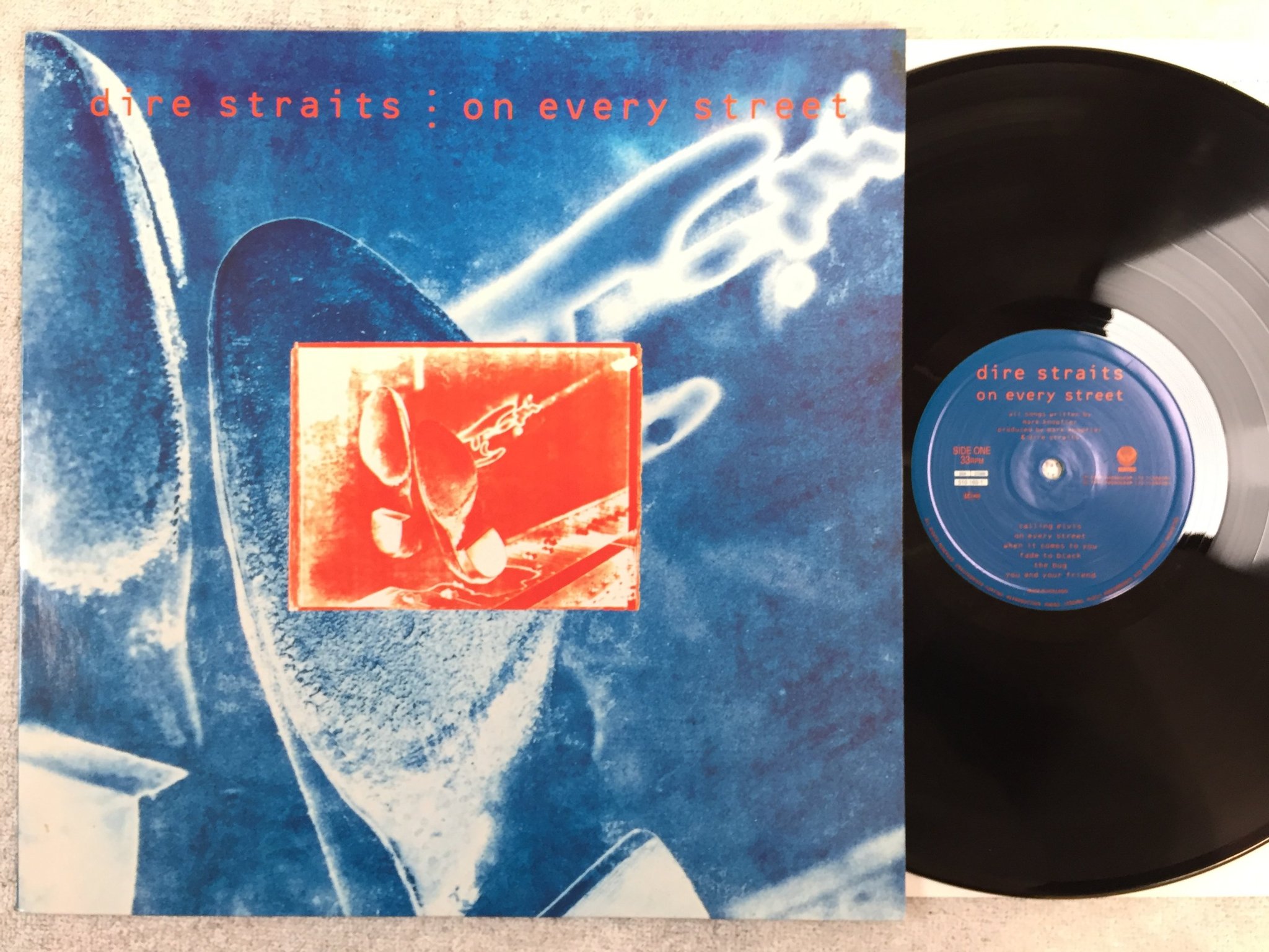 Omslagsbild för skivan DIRE STRAITS on every street LP -91 Hol VERTIGO 510160-1