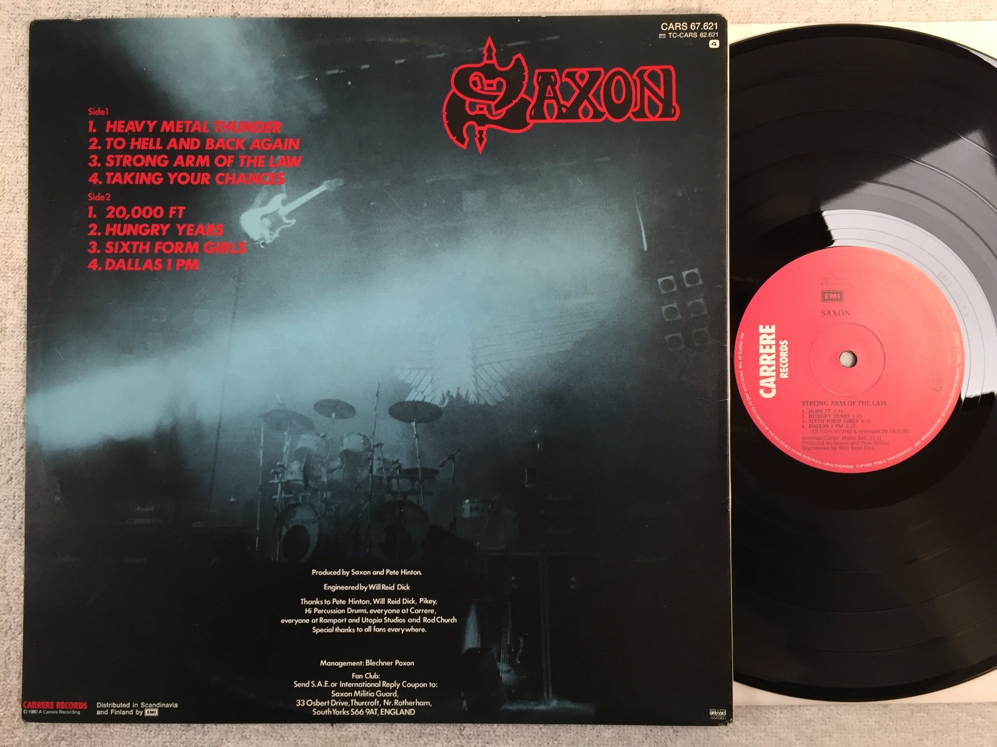 Omslagsbild för skivan SAXON strong arm of the law LP -80 ncb CARRERE CARS 67621