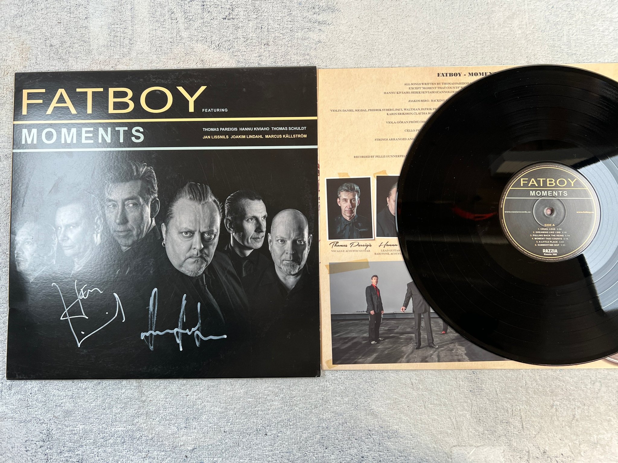 Omslagsbild för skivan FATBOY moments LP 2016 Swe RAZZIA 368 signed on front and back ROCKABILLY