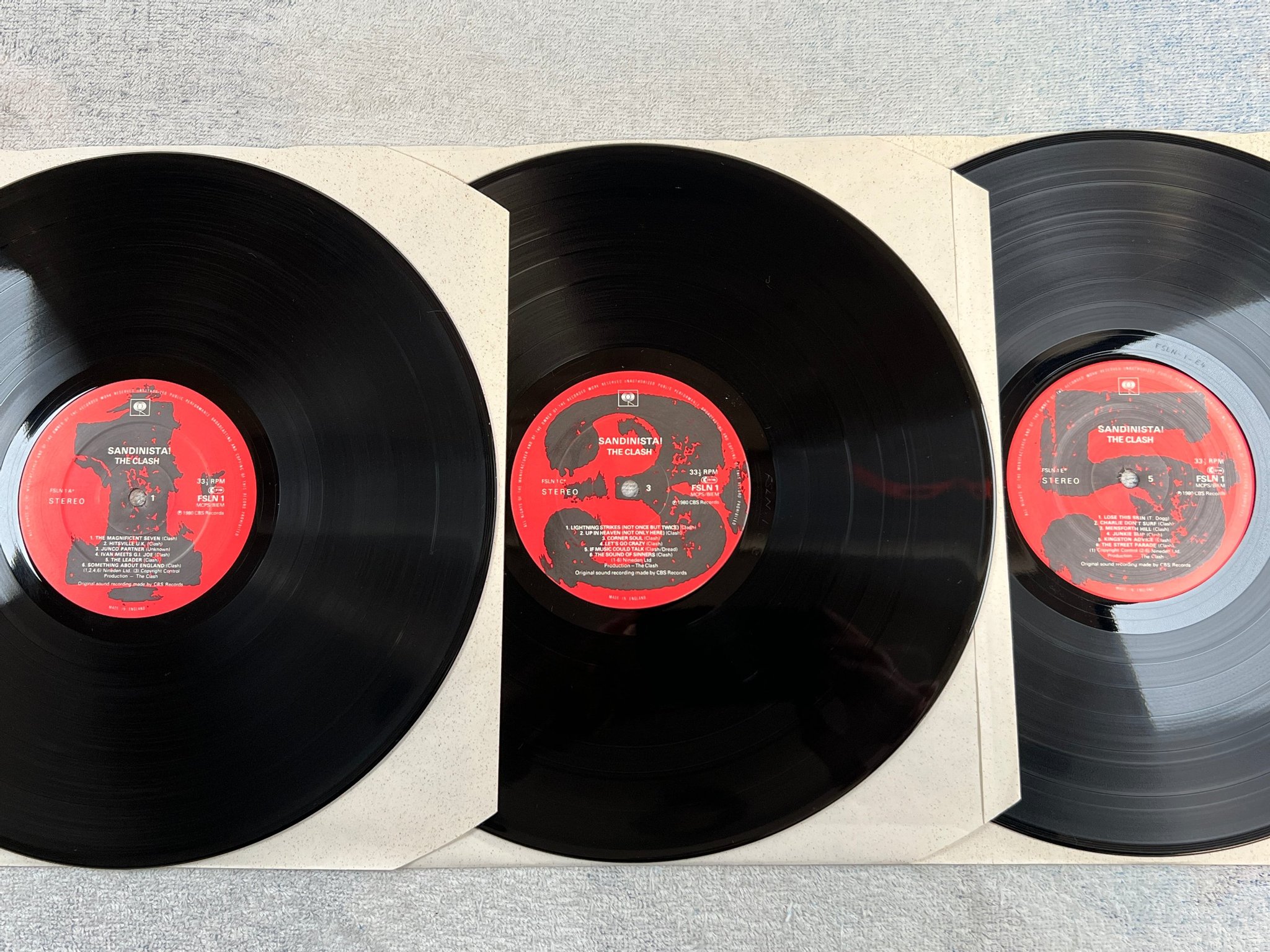 Omslagsbild för skivan THE CLASH sandinista! 3xLP -80 CBS FSLN 1 