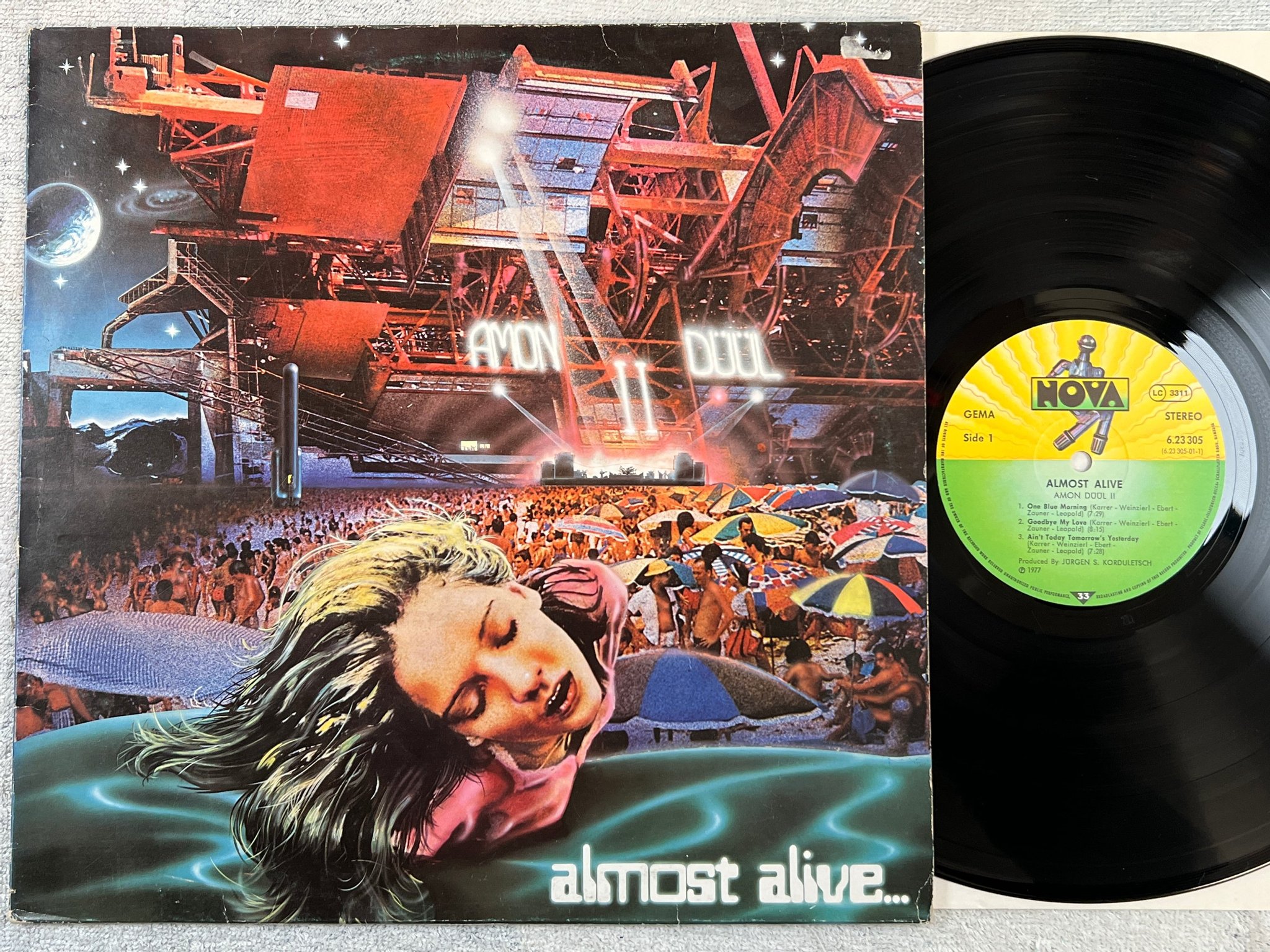 Omslagsbild för skivan AMON DUUL II almost alive LP -77 Ger NOVA 623305