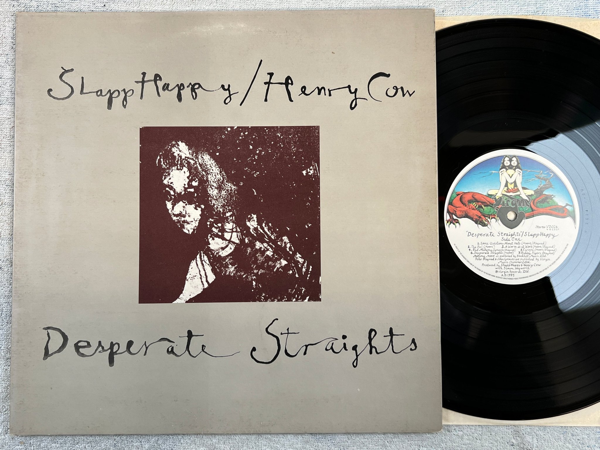 Omslagsbild för skivan HENRY COW / SLAPP HAPPY desperate straights LP -75 UK VIRGIN V2024