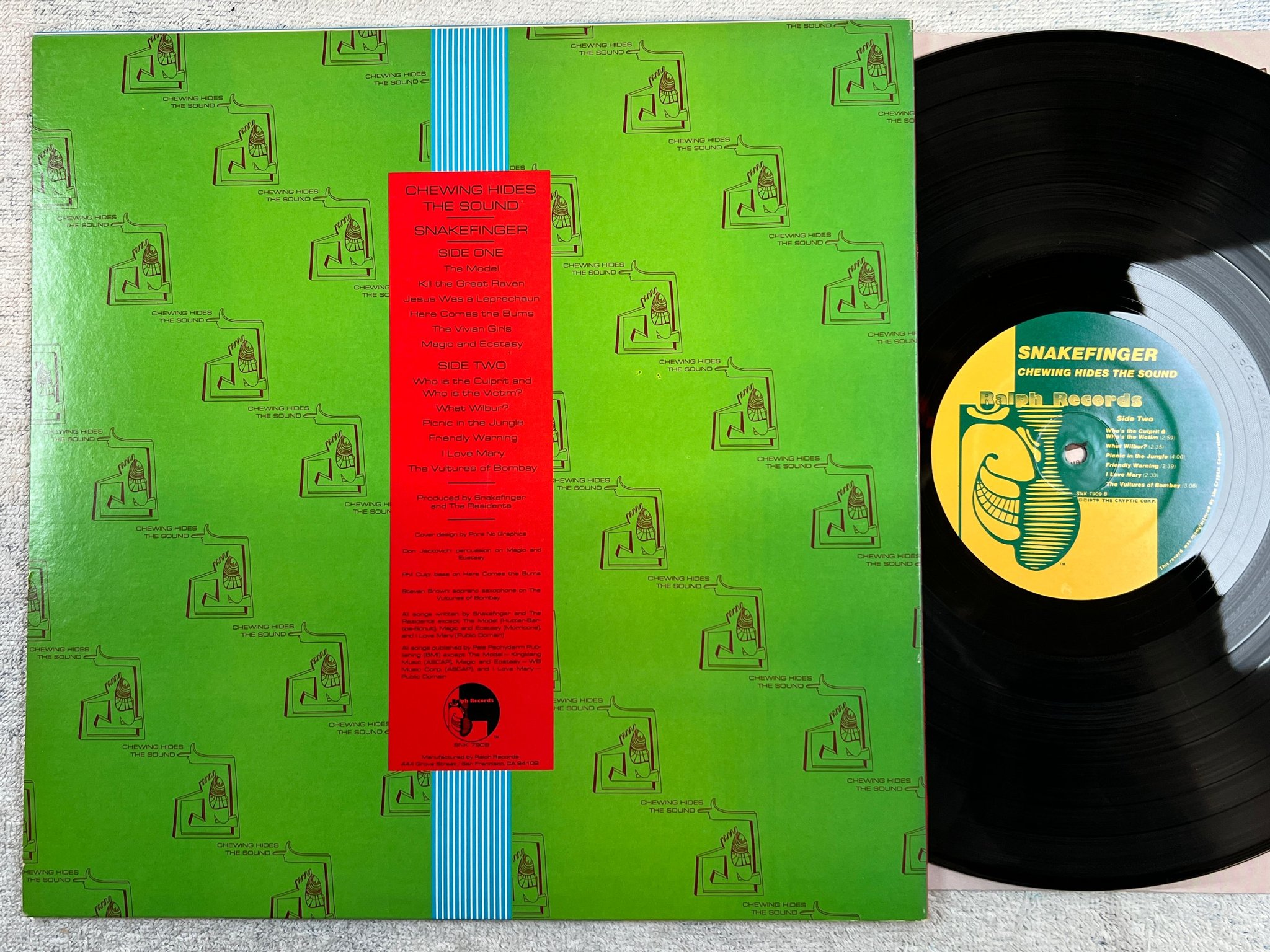 Omslagsbild för skivan SNAKEFINGER chewing hides the sound LP -79 US RALPH SNK 7909 experimental