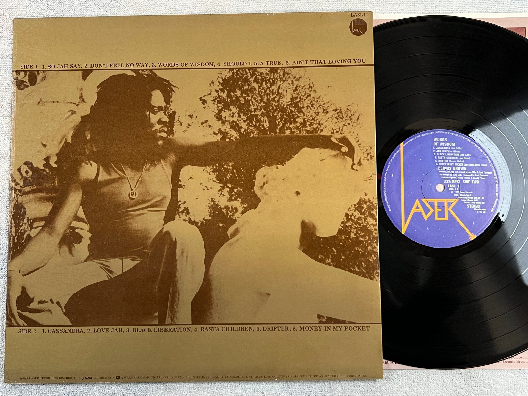 Omslagsbild för skivan DENNIS BROWN words of wisdom LP -79 UK LASER LASL 1 ”black liberation”