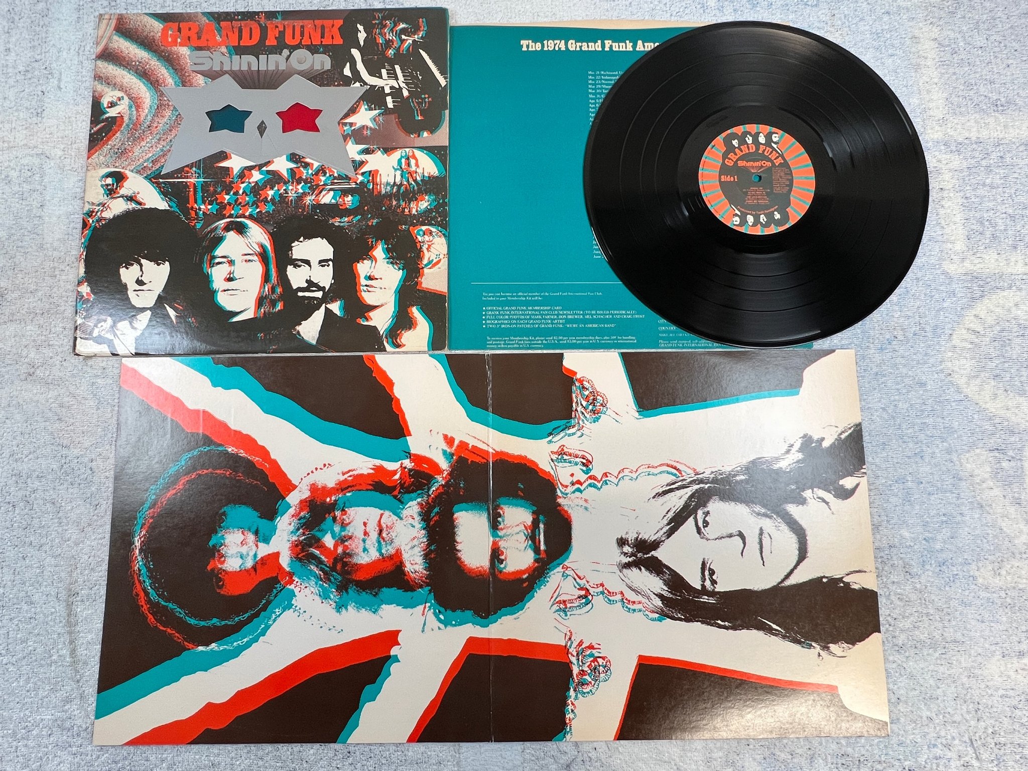 Omslagsbild för skivan GRAND FUNK shinin' on LP -74 US CAPITOL SWAE-11278 W/ GLASSES
