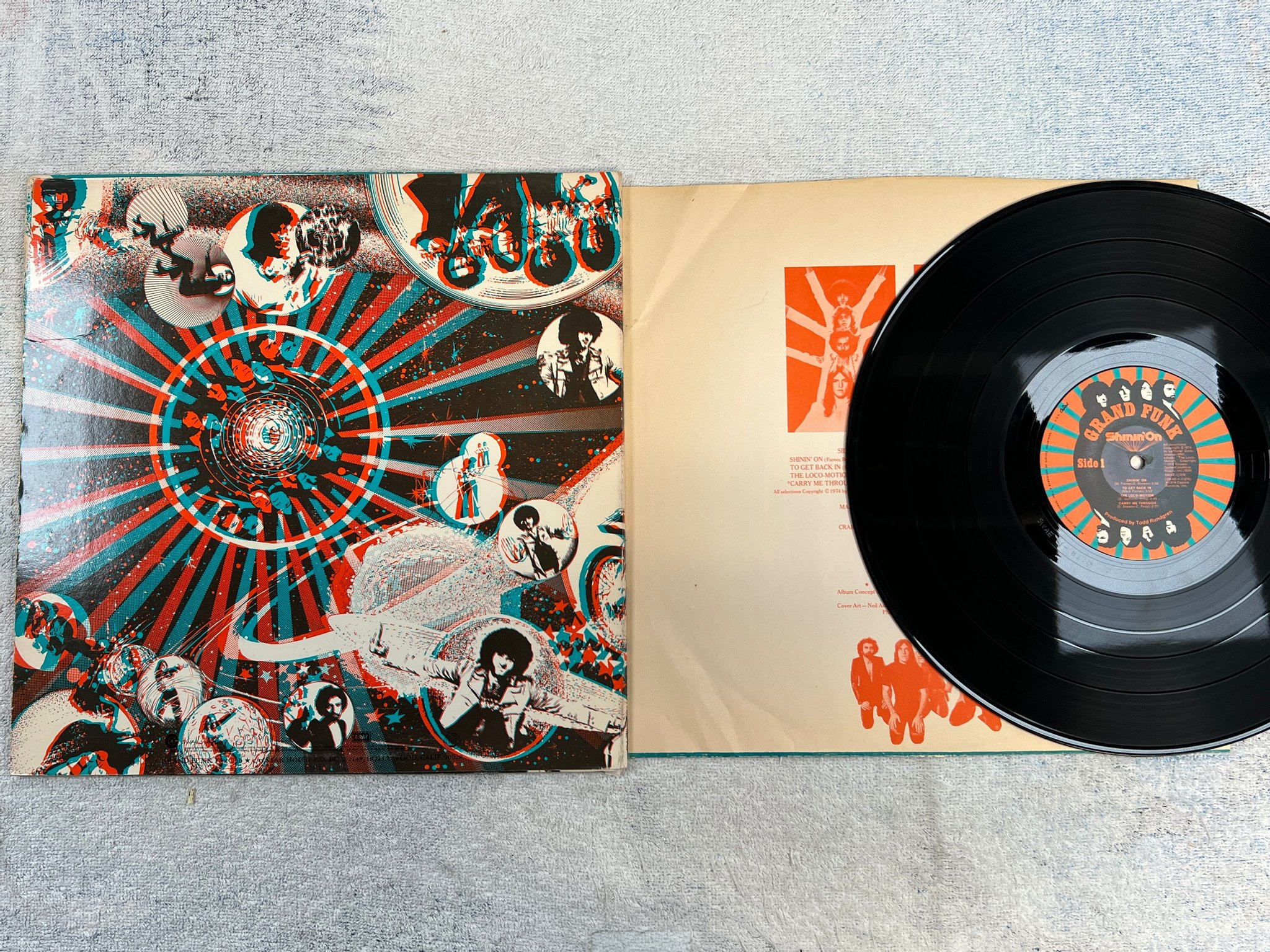 Omslagsbild för skivan GRAND FUNK shinin' on LP -74 US CAPITOL SWAE-11278 W/ GLASSES