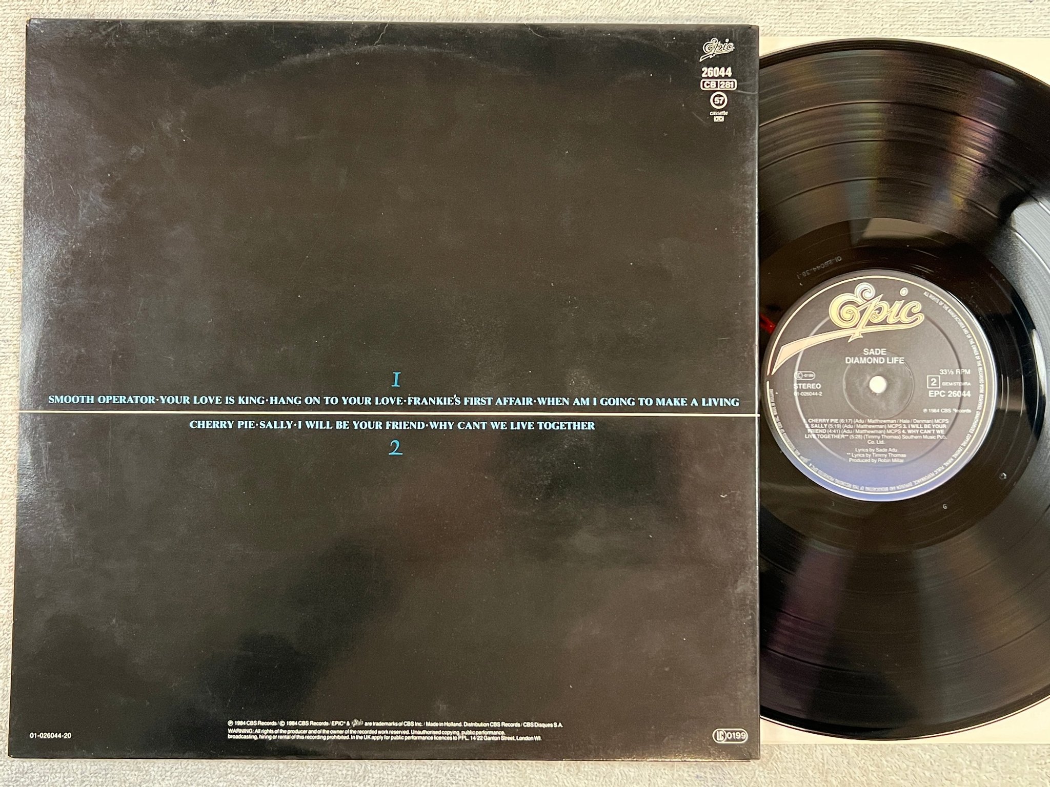 Omslagsbild för skivan SADE diamond life LP -84 Hol EPIC EPC 26044