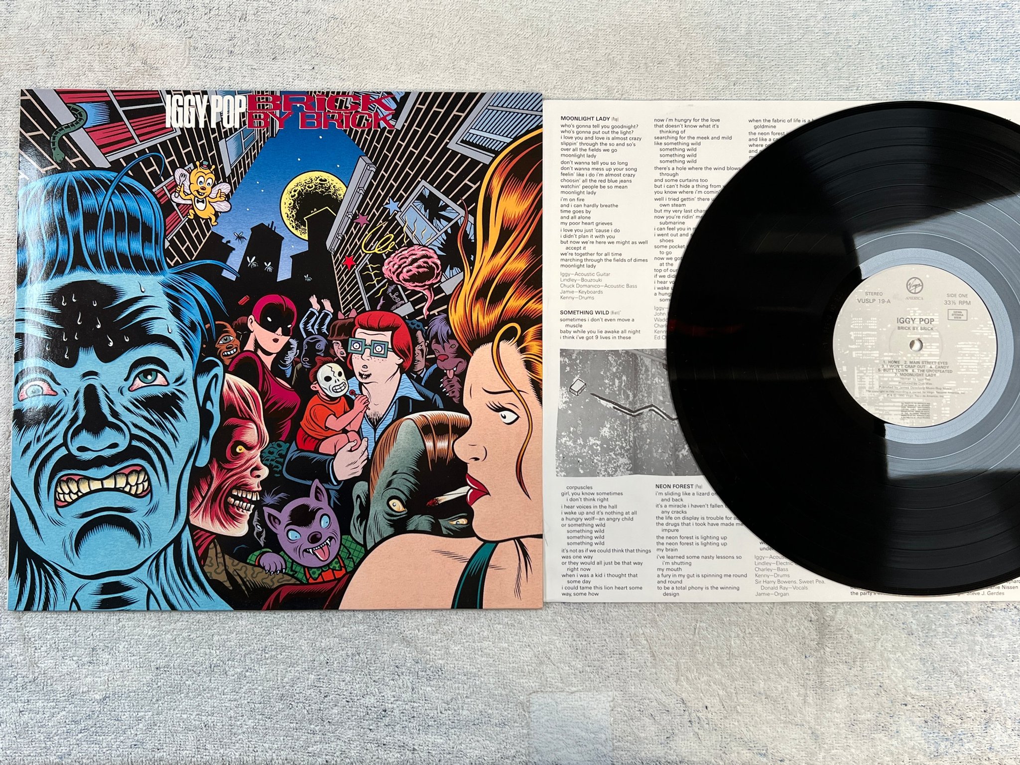 Omslagsbild för skivan IGGY POP brick by brick LP -90 Hol VIRGIN VUSLP 19