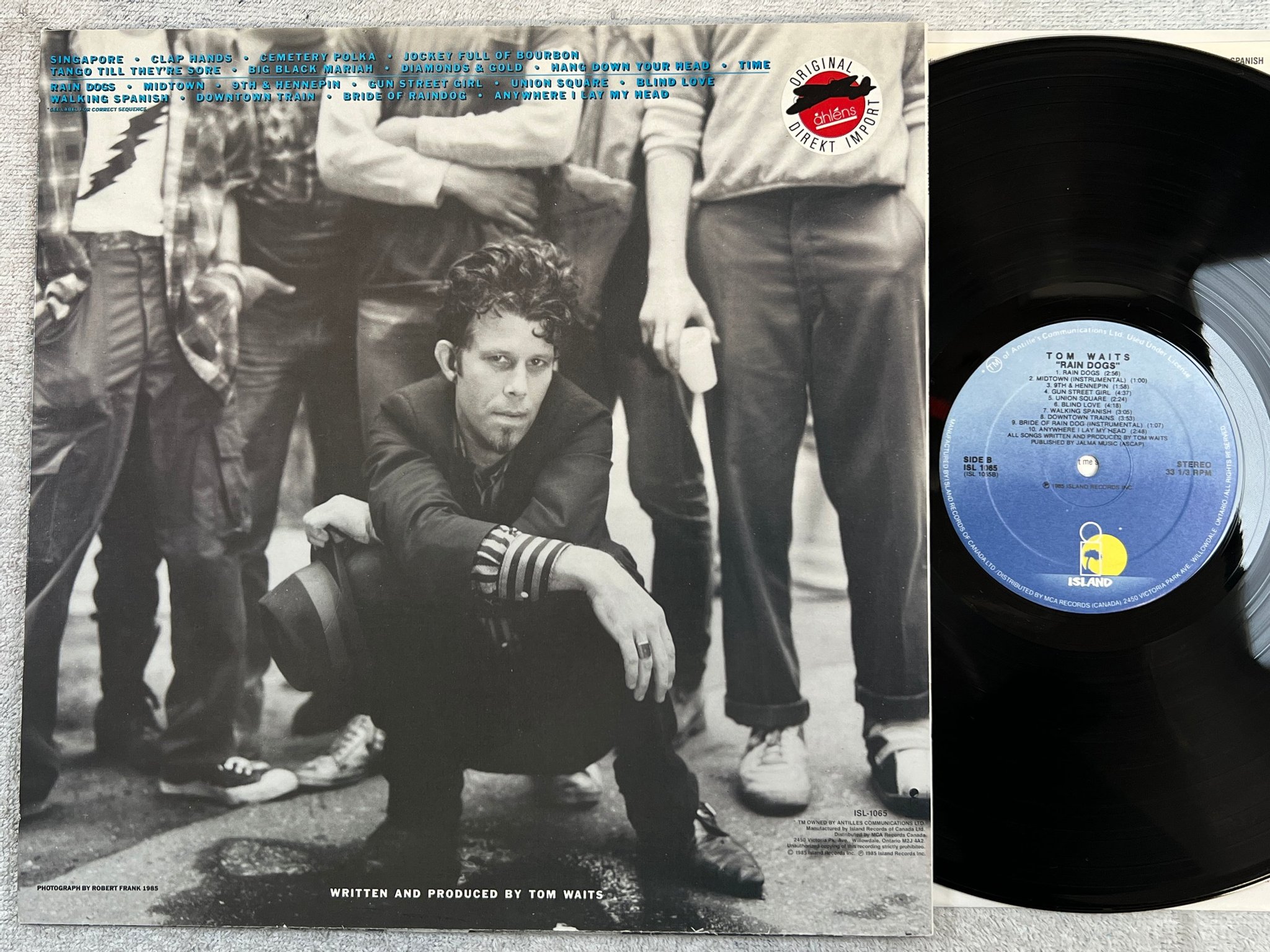Omslagsbild för skivan TOM WAITS rain dogs LP -85 Can ISLAND ISL 1065