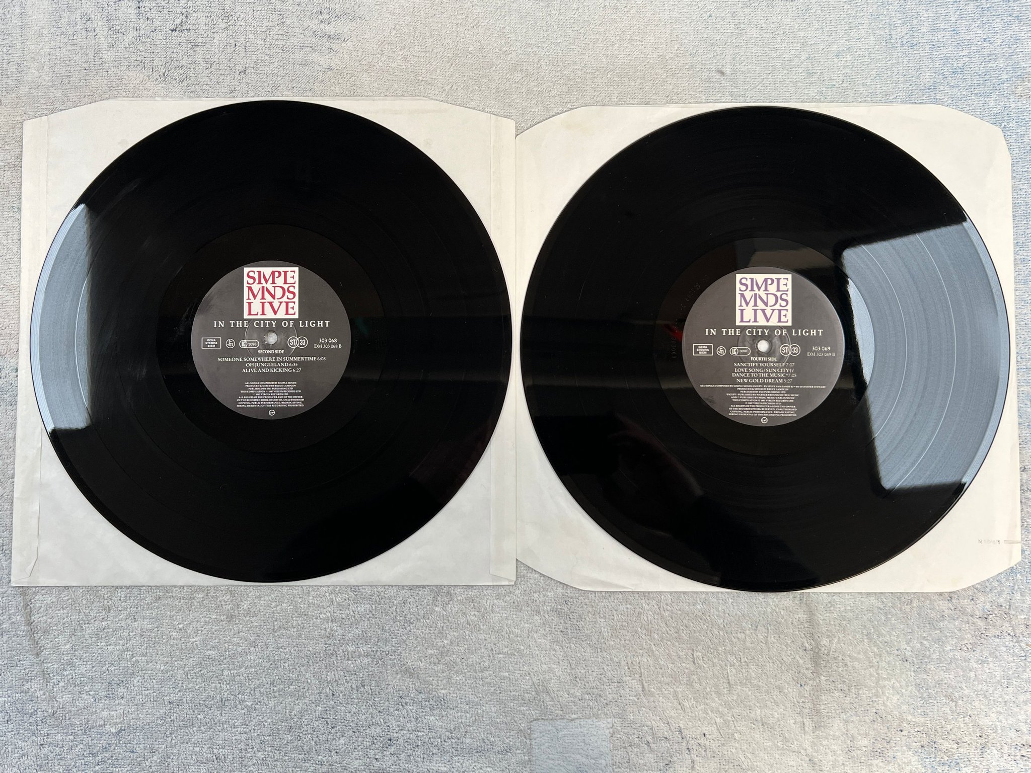 Omslagsbild för skivan SIMPLE MINDS live - in the city of light 2xLP -87 VIRGIN 303069