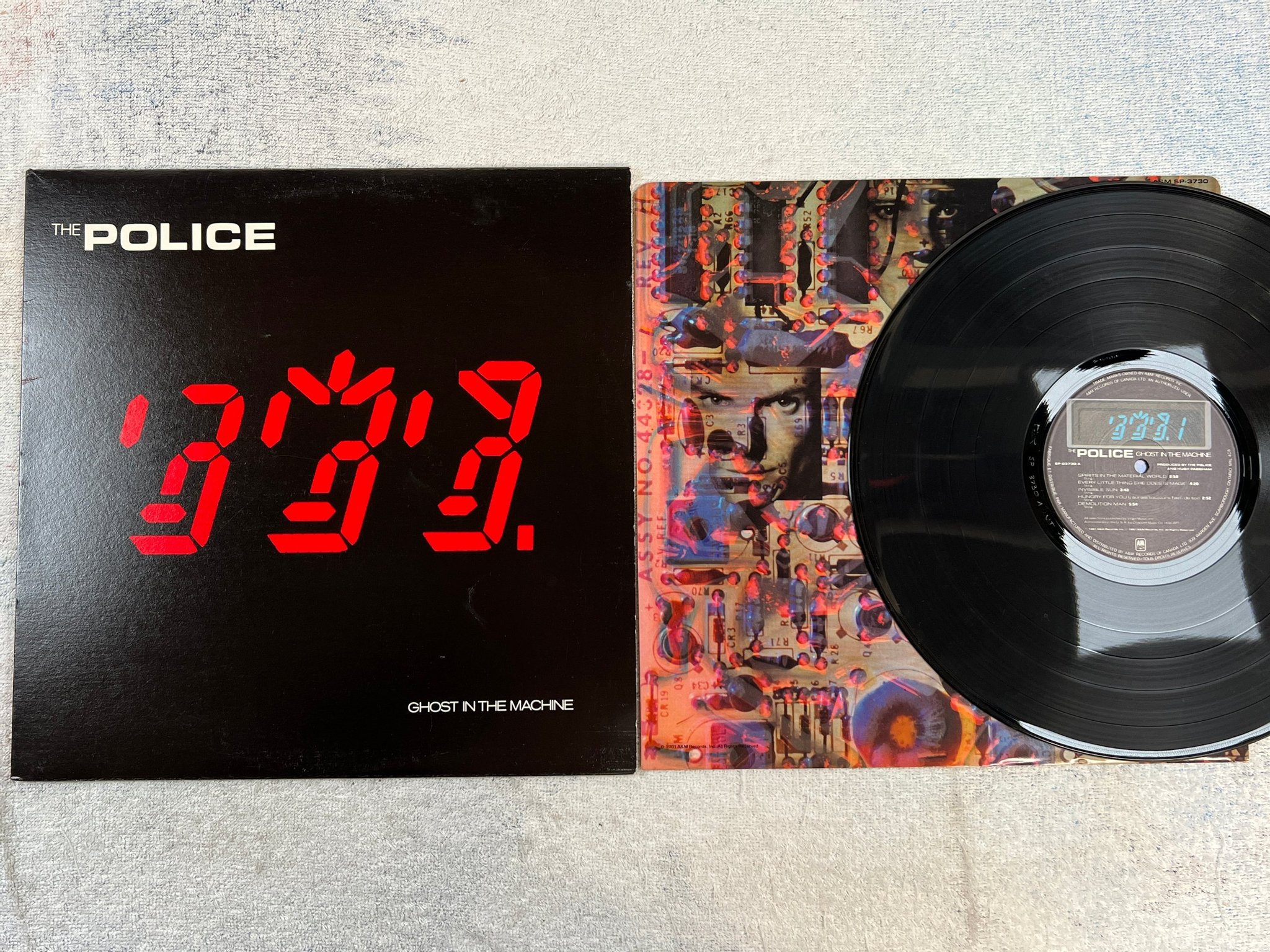 Omslagsbild för skivan THE POLICE ghost in the machine LP -81 Can A&M SP-03730