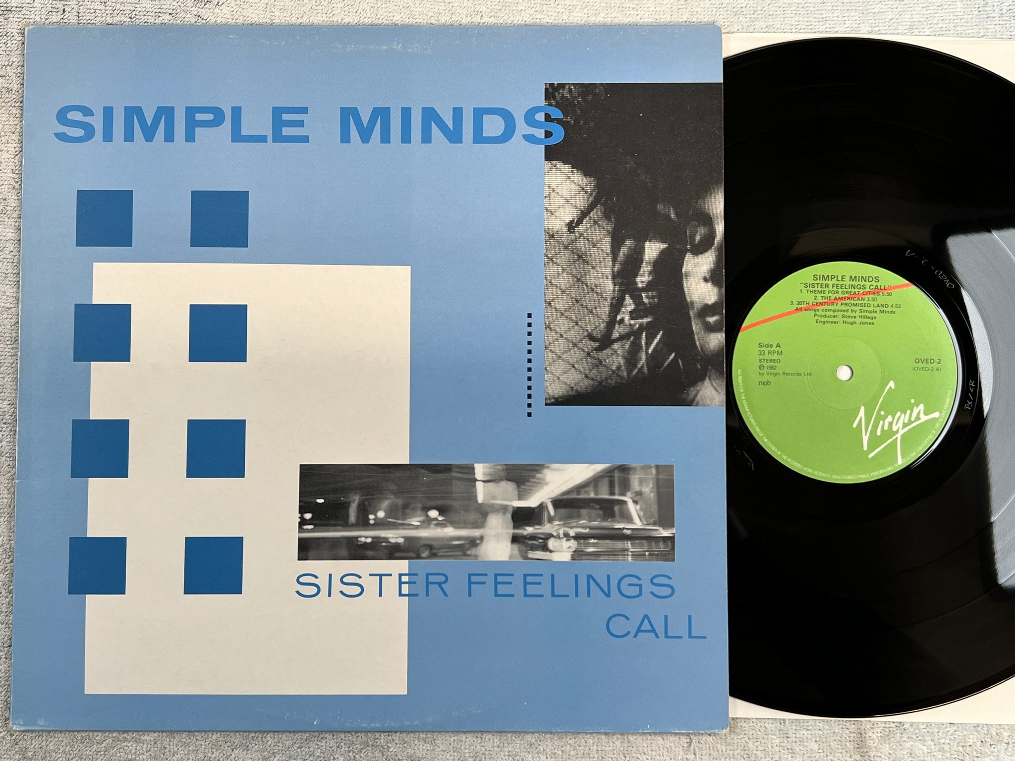 Omslagsbild för skivan SIMPLE MINDS sister feelings call LP -82 ncb VIRGIN OVED-2