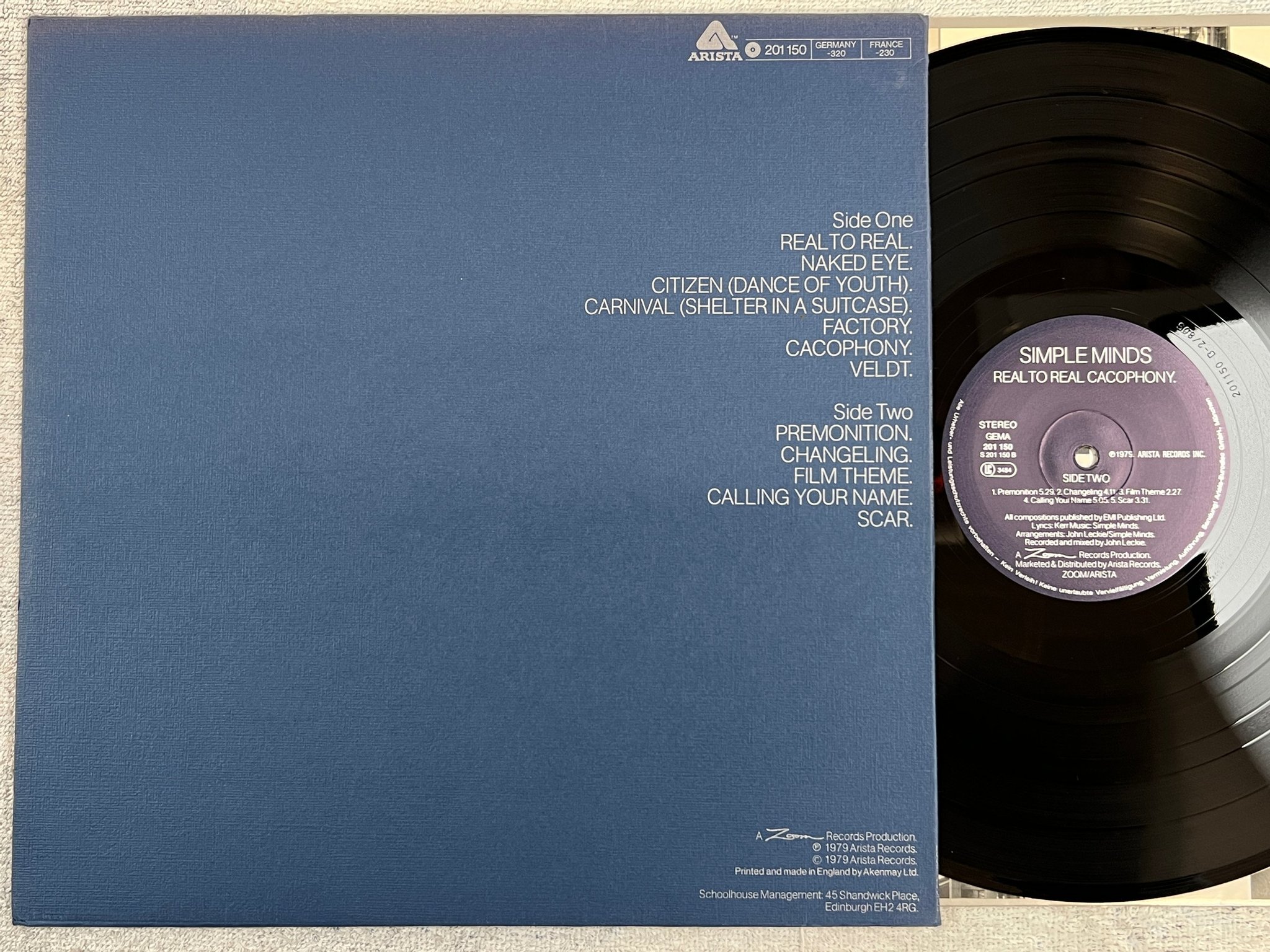 Omslagsbild för skivan SIMPLE MINDS real to real cacophony LP -79 Ger ARISTA 201150