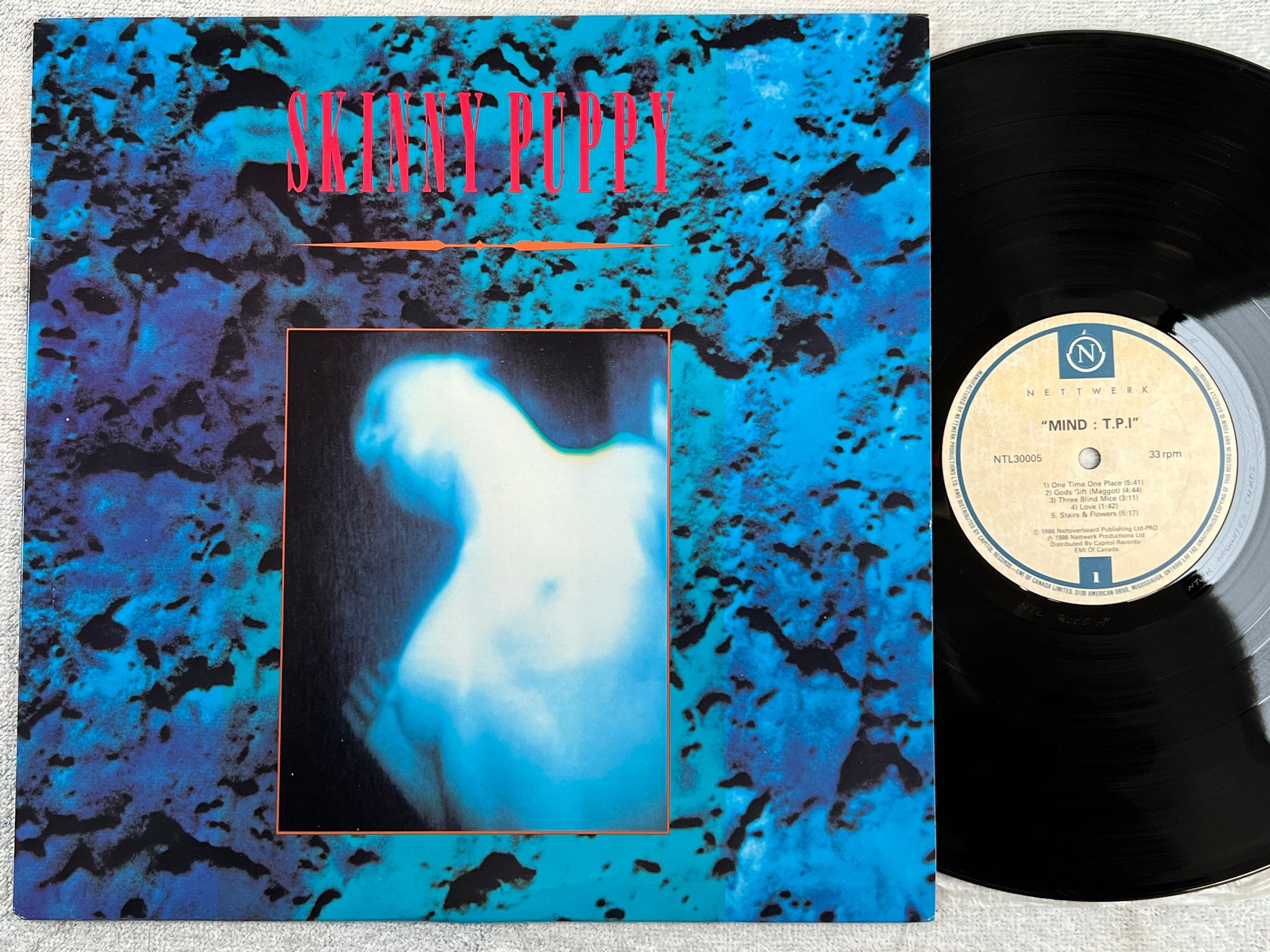 Omslagsbild för skivan SKINNY PUPPY Mind: The Perpetual Intercourse LP -86 Can NETTWORK NTL30005 