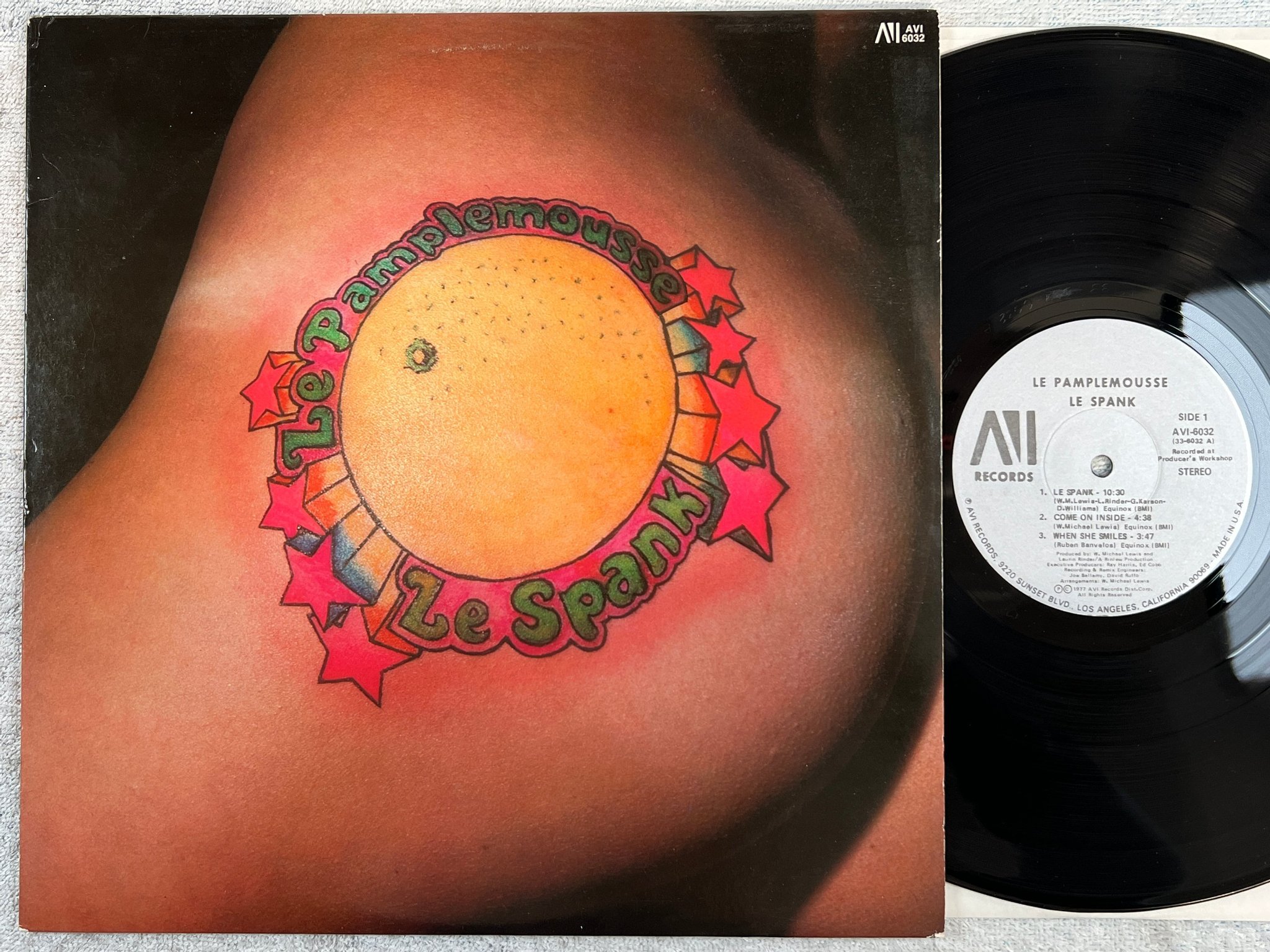 Omslagsbild för skivan LE PAMPLEMOUSSE le spank LP -77 US AVI 6032 disco
