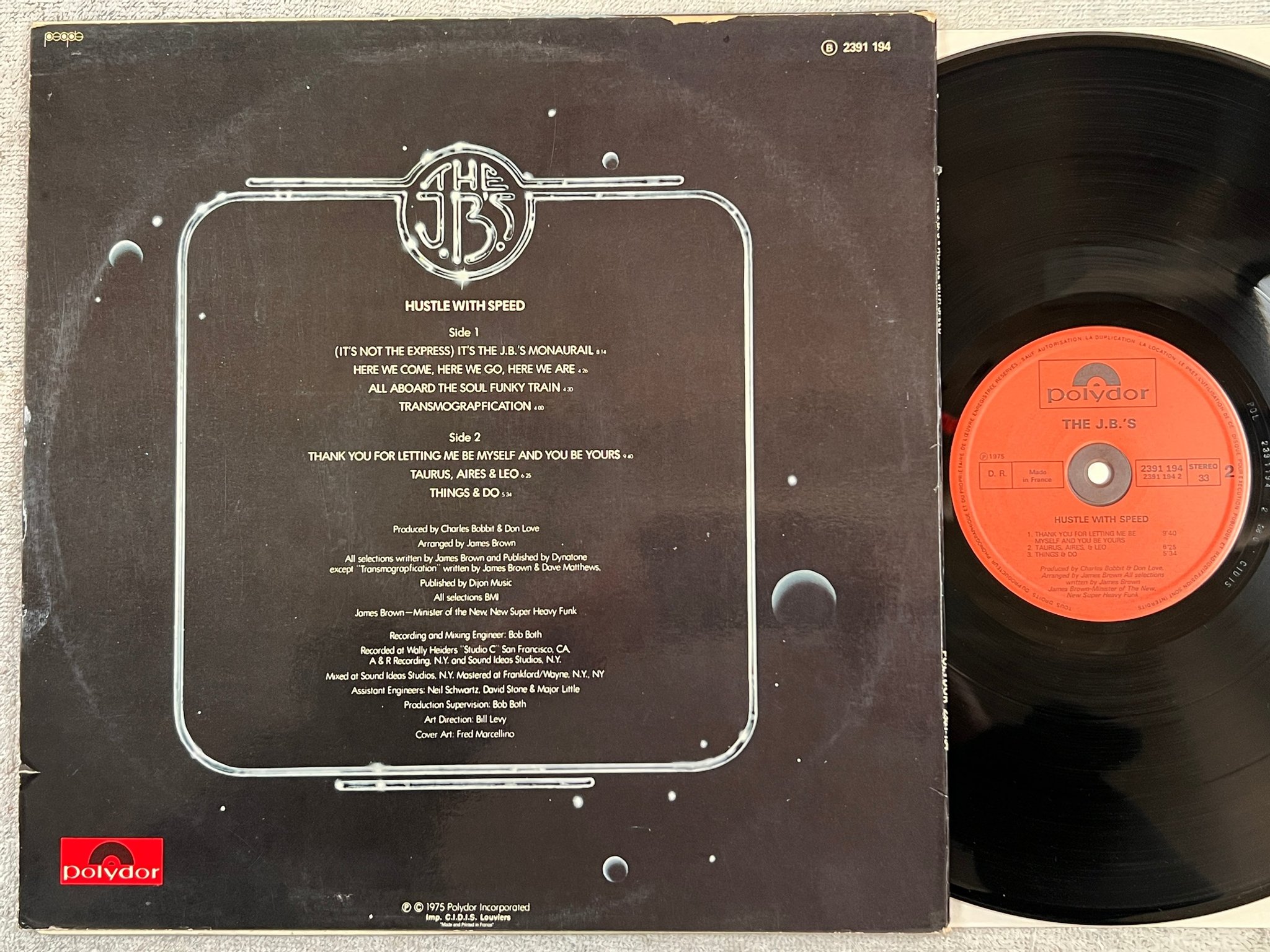 Omslagsbild för skivan THE J.B.'S hustle with speed LP -75 Fra POLYDOR 2391 194 