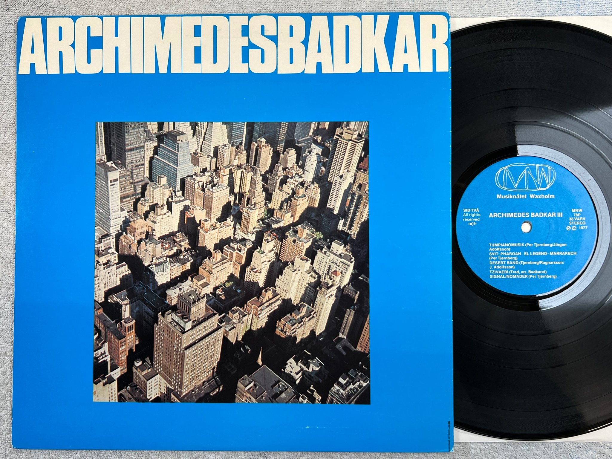 Omslagsbild för skivan ARCHIMEDES BADKAR III LP -77 MNW 78P Per Tjernberg