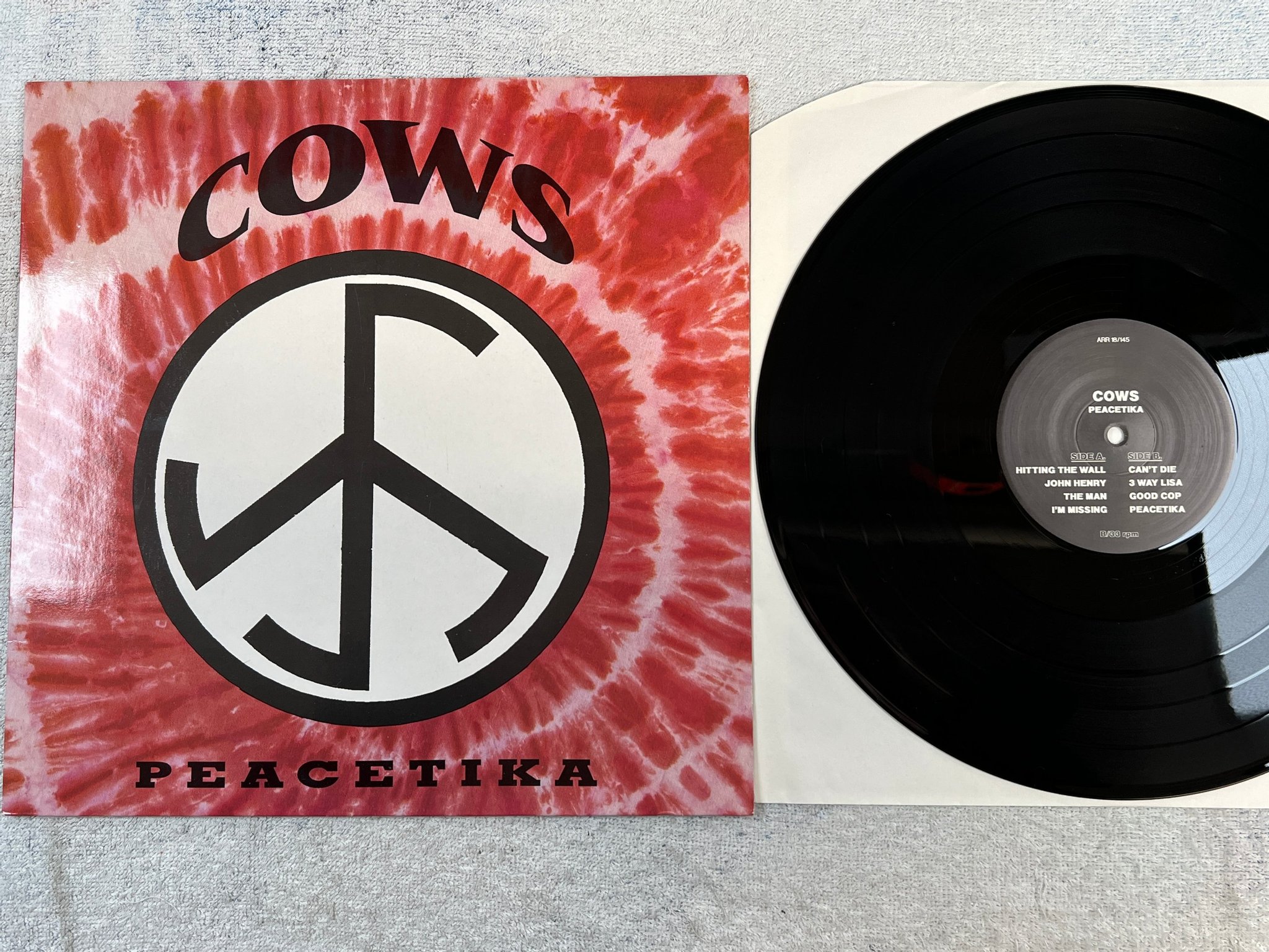 Omslagsbild för skivan COWS peacetika LP -91 Amphetamine Reptile ARR 18/145 punkrock