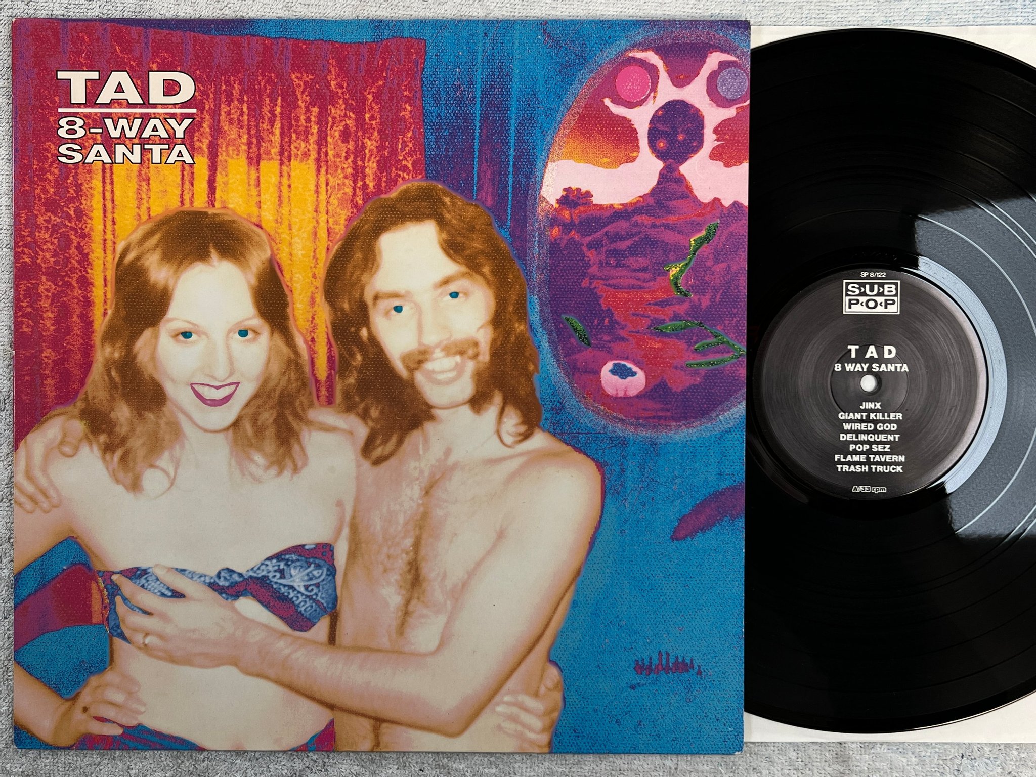 Omslagsbild för skivan TAD 8-Way Santa LP -91 SUB POP SP8/122 GRUNGE 