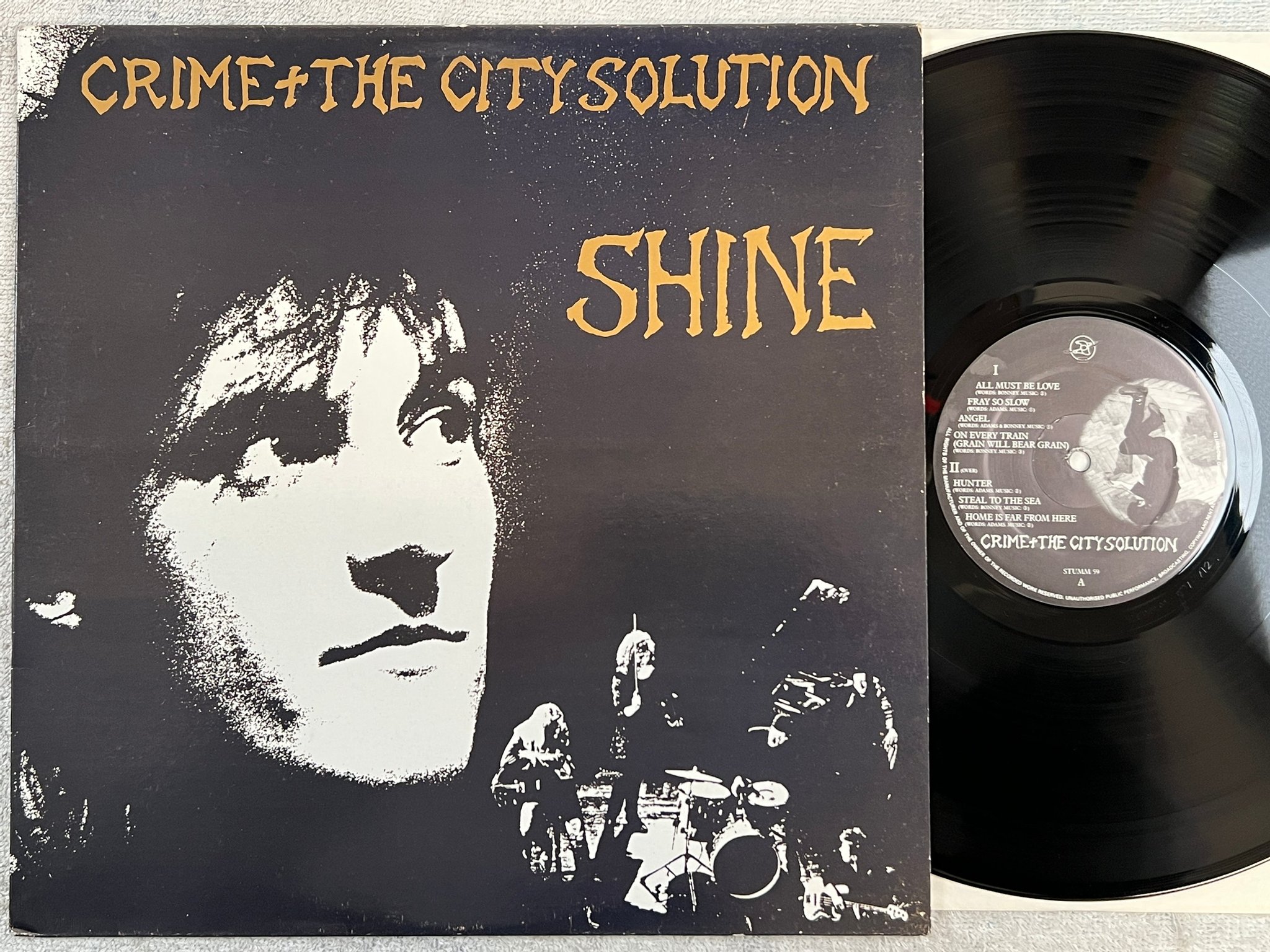 Omslagsbild för skivan CRIME + THE CITY SOLUTION shine LP -88 UK MUTE STUMM 59 alternative rock