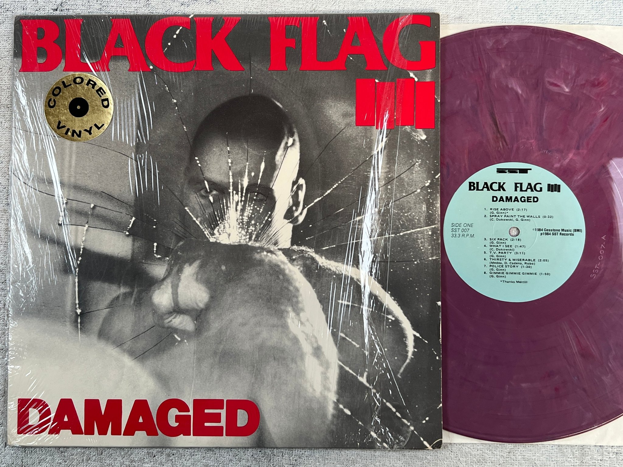 Omslagsbild för skivan BLACK FLAG Damaged LP re -90 US SST 007 hardcore PINK/MARBLED VINYL