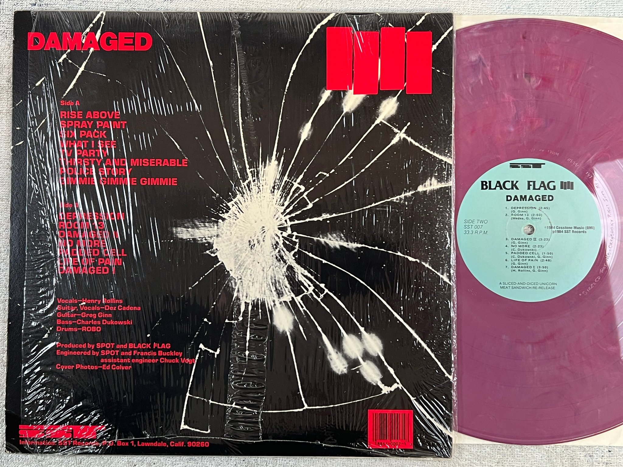 Omslagsbild för skivan BLACK FLAG Damaged LP re -90 US SST 007 hardcore PINK/MARBLED VINYL