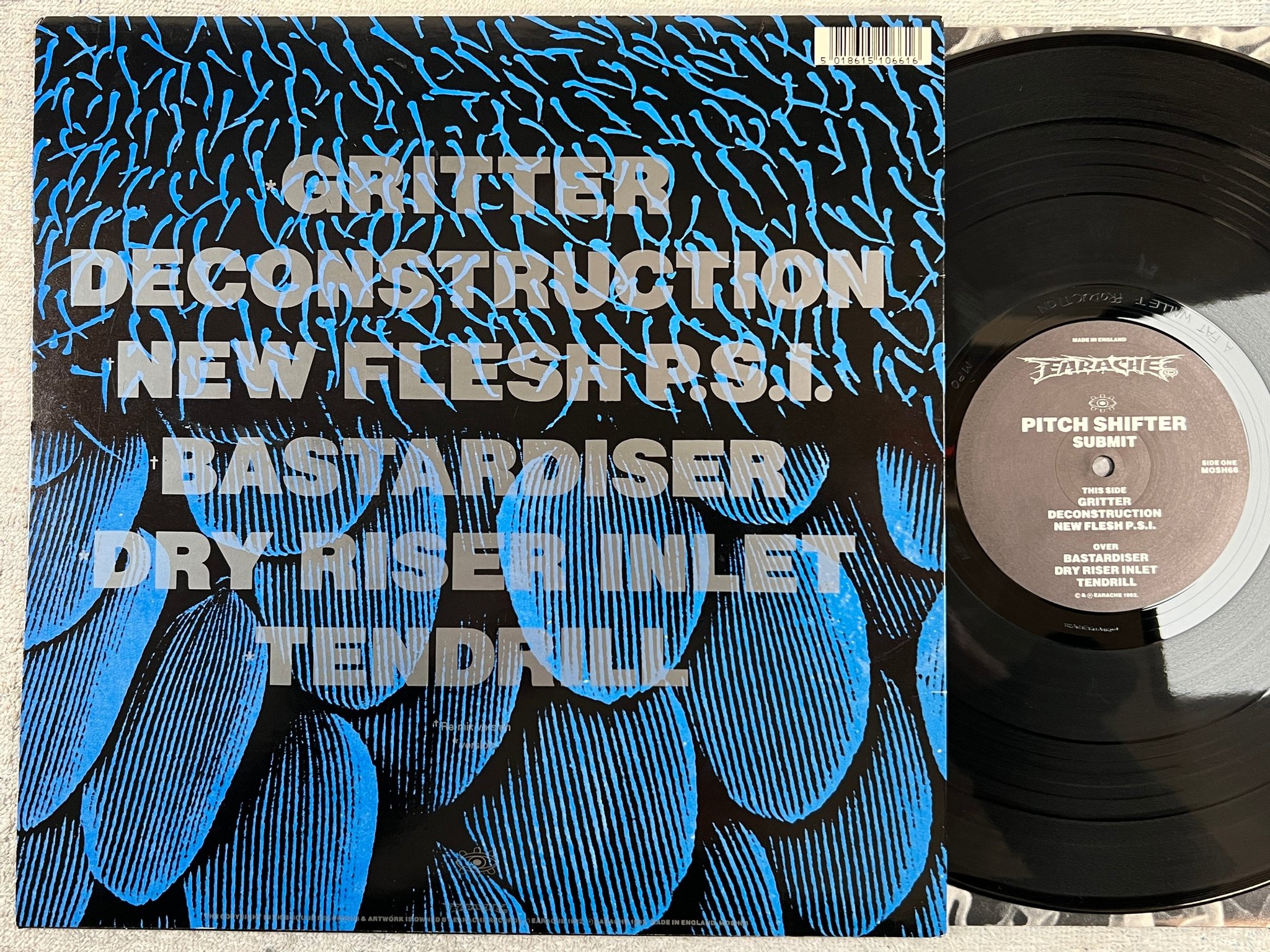 Omslagsbild för skivan PITCH SHIFTER submit LP -92 UK EARACHE MOSH-66