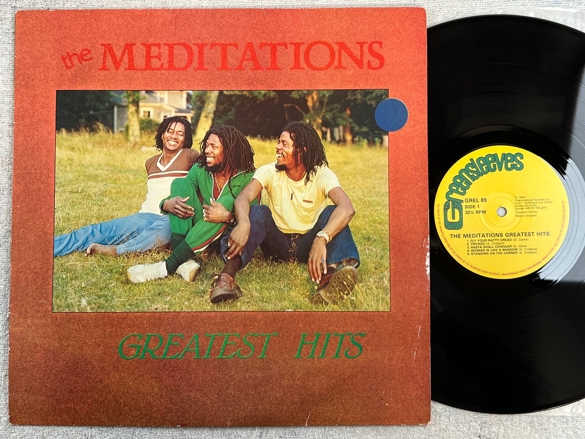 Omslagsbild för skivan THE MEDITATIONS greatest hits LP -84 UK GREENSLEEVES GREL 69