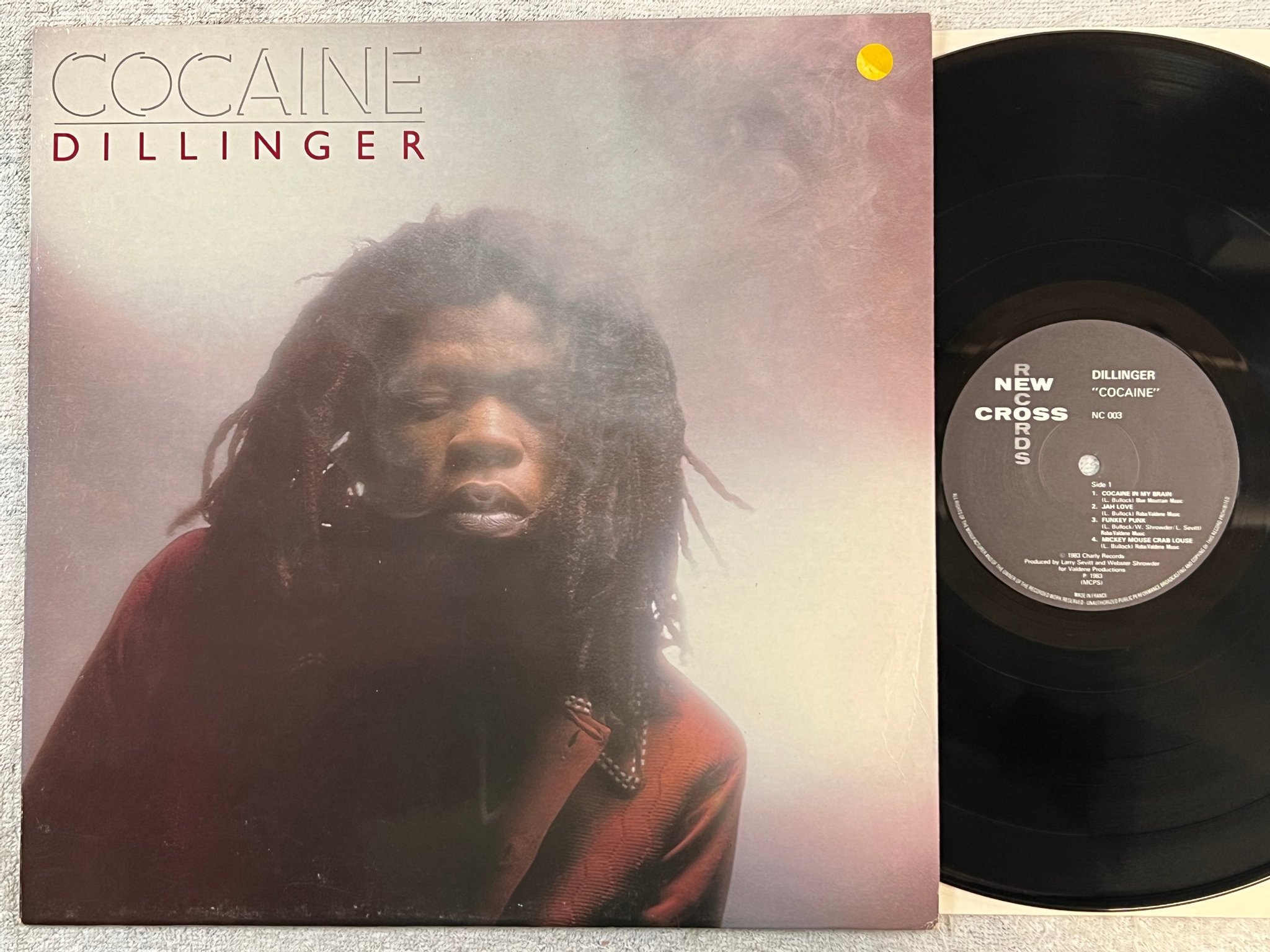 Omslagsbild för skivan DILLINGER cocaine LP -83 fra NEW CROSS NC 003