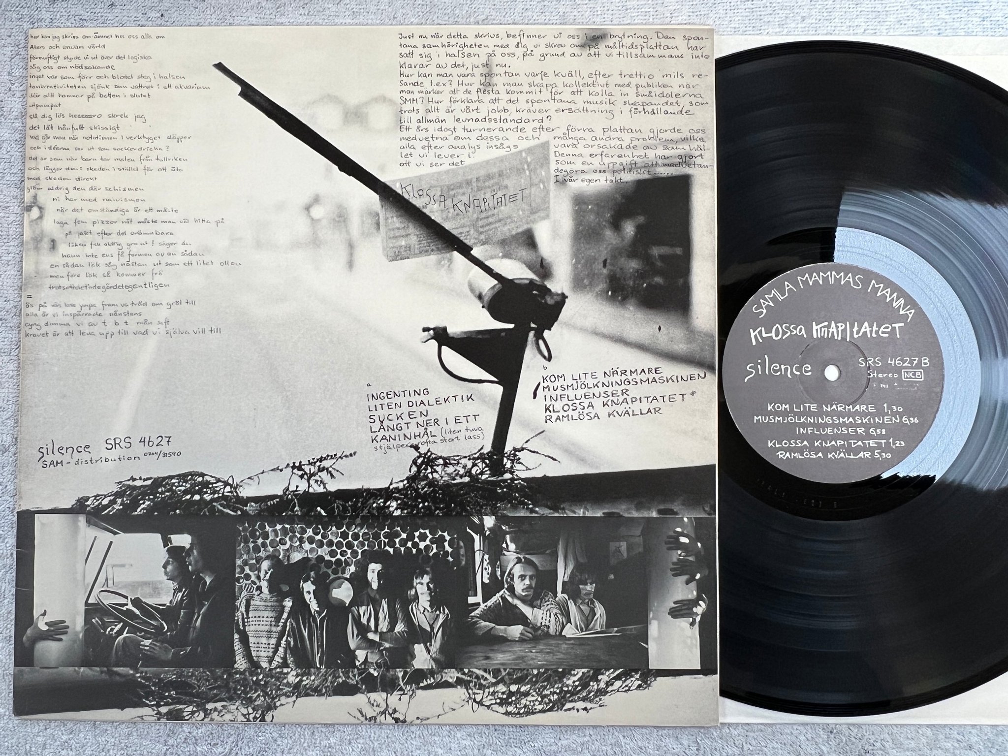 Omslagsbild för skivan SAMLA MAMMAS MANNA klossa knapitalet LP -74 Swe SILENCE SRS 4627