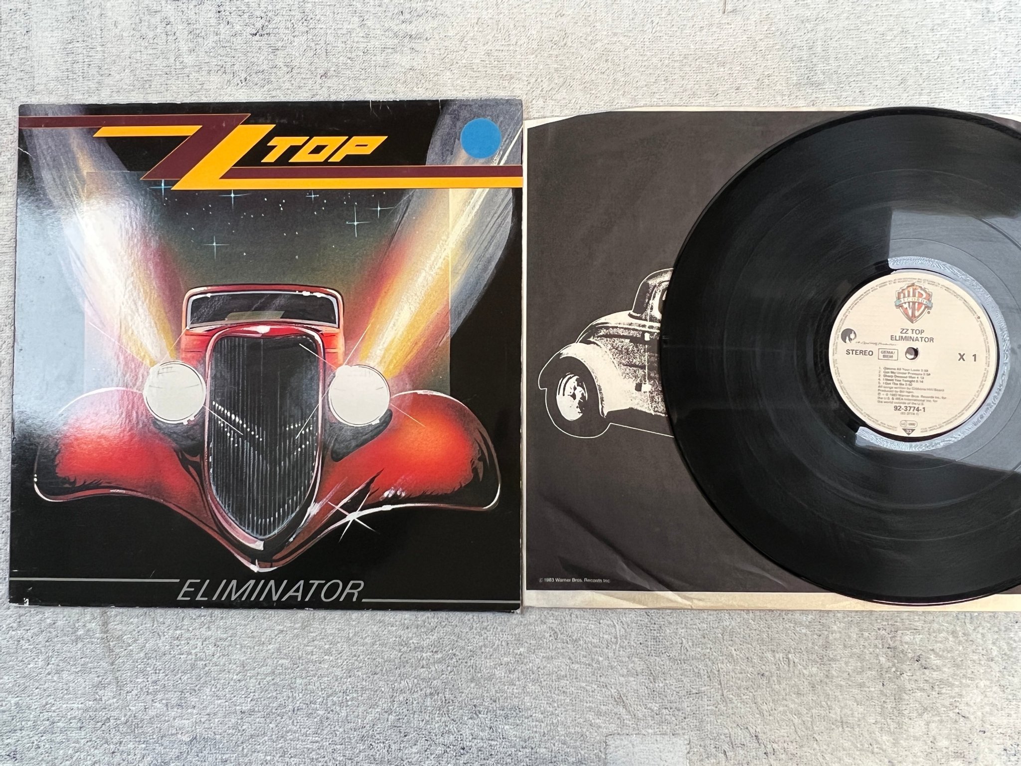 Omslagsbild för skivan ZZ TOP eliminator LP -83 Ger WARNER BROS 92-3774-1