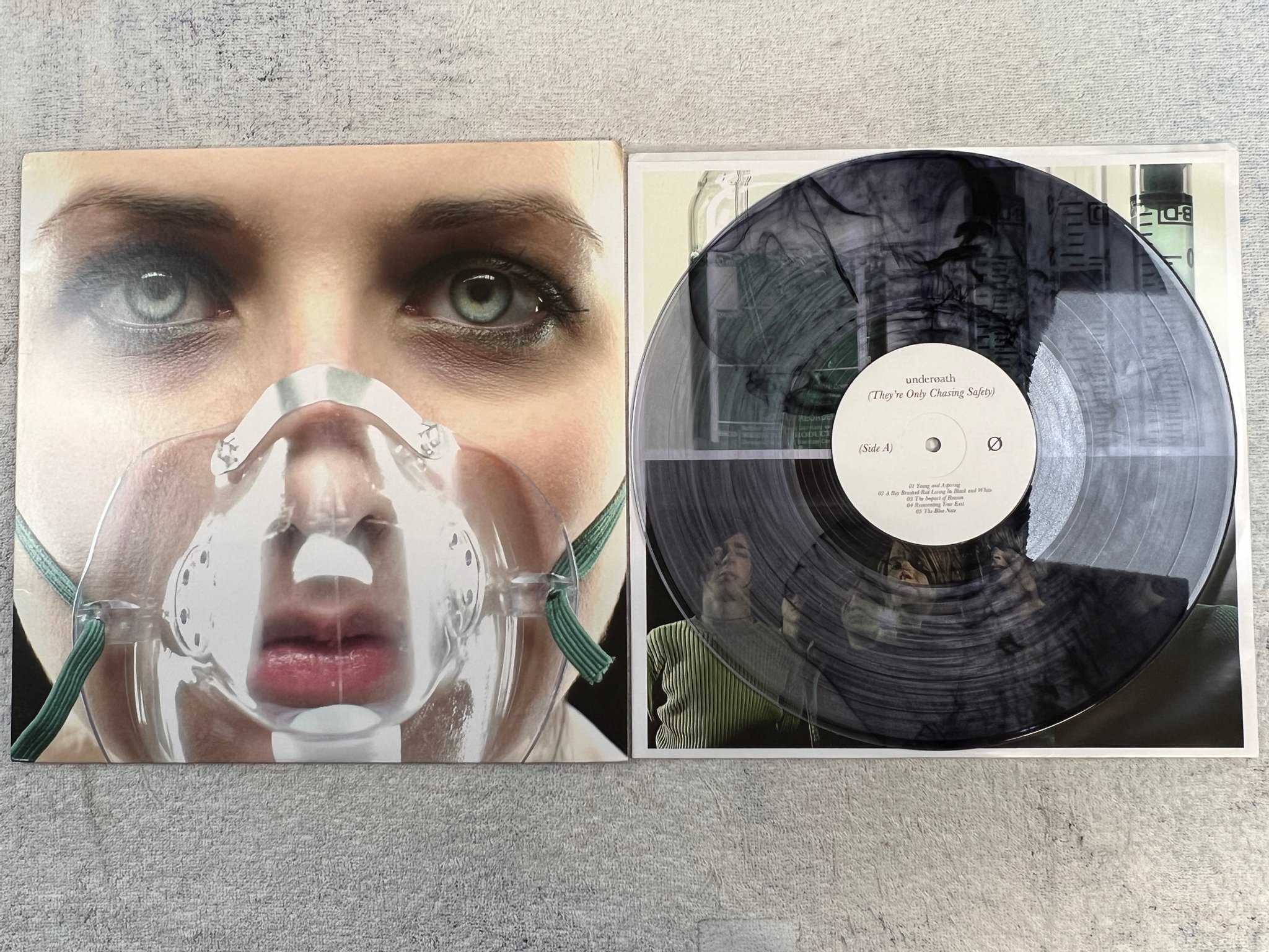Omslagsbild för skivan UNDEROATH They're Only Chasing Safety LP US 2021 re Transparent  Smoke Vinyl ** 