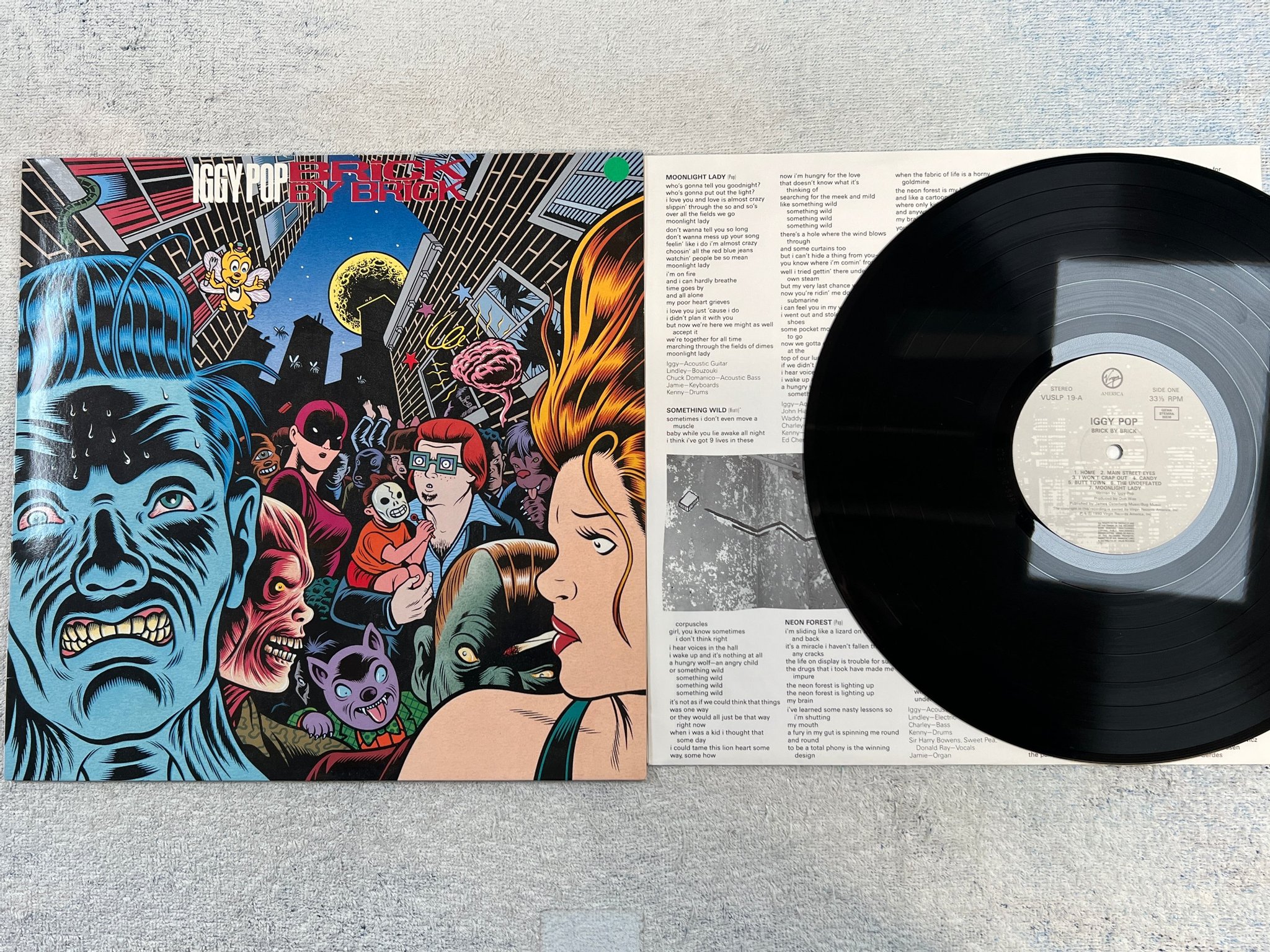 Omslagsbild för skivan IGGY POP brick by brick LP -90 VIRGIN VUSLP 19