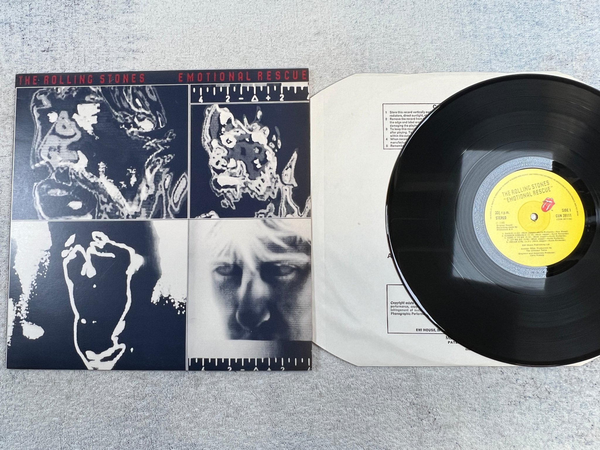 Omslagsbild för skivan ROLLING STONES emotional rescue LP -80 UK CUN 39111 + poster
