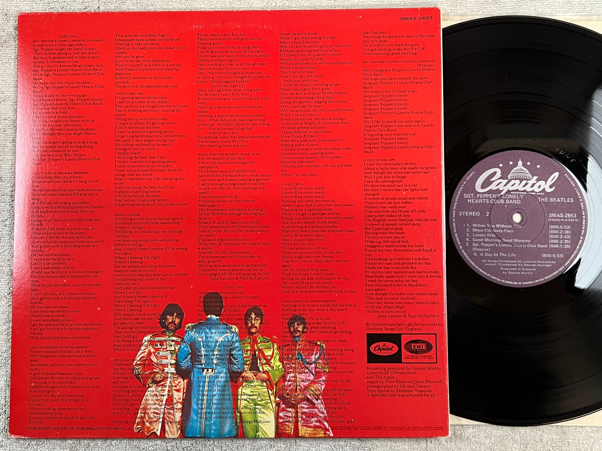 Omslagsbild för skivan THE BEATLES Sgt Pepper's lonely heart band LP re Can CAPITOL SMAS 2653
