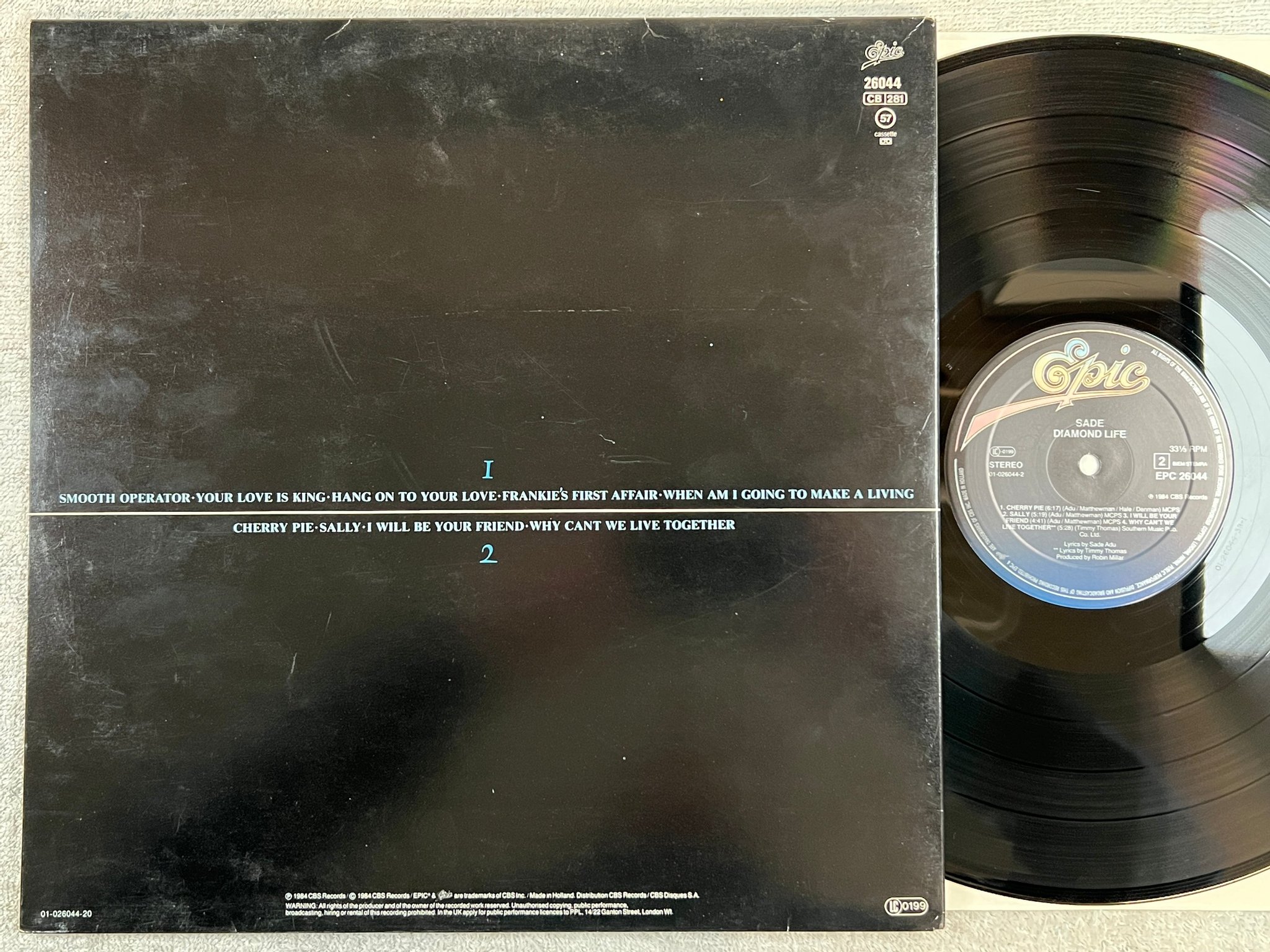 Omslagsbild för skivan SADE diamond life LP -84 Hol EPIC EPC 26044