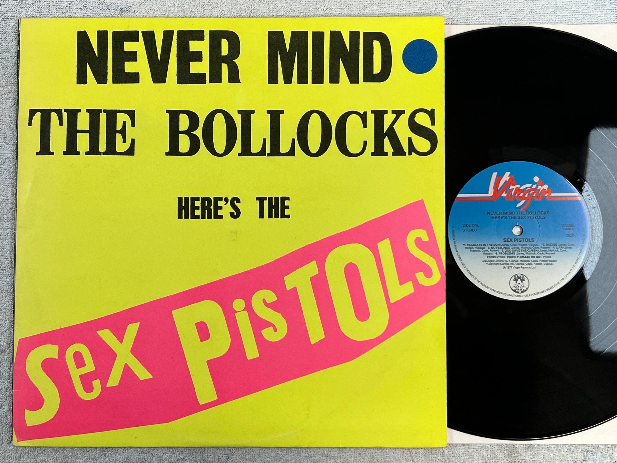 Omslagsbild för skivan SEX PISTOLS never mind the bollocks LP -77 ncb VIRGIN V2086 ***yeah***